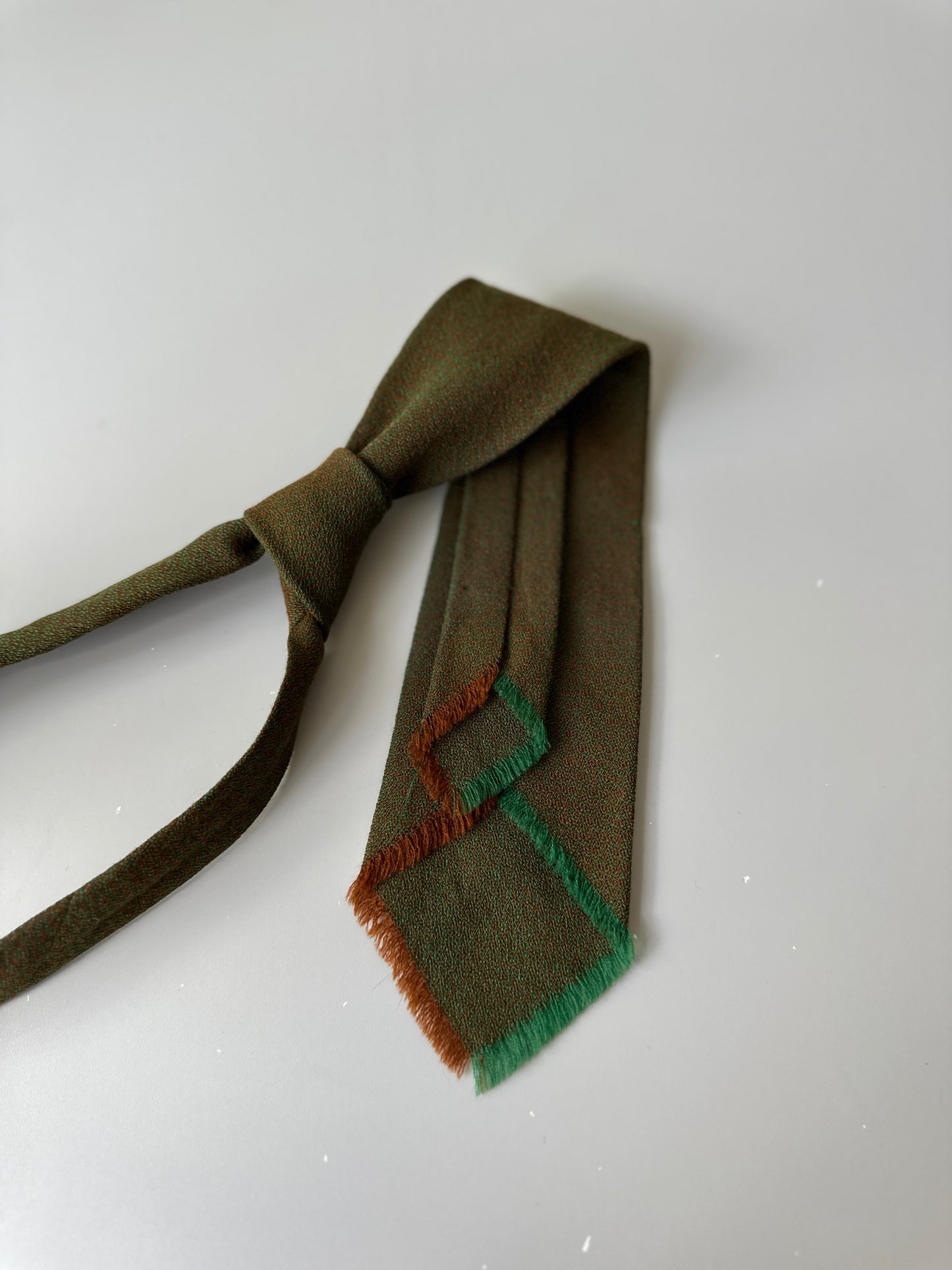 green toned tie
