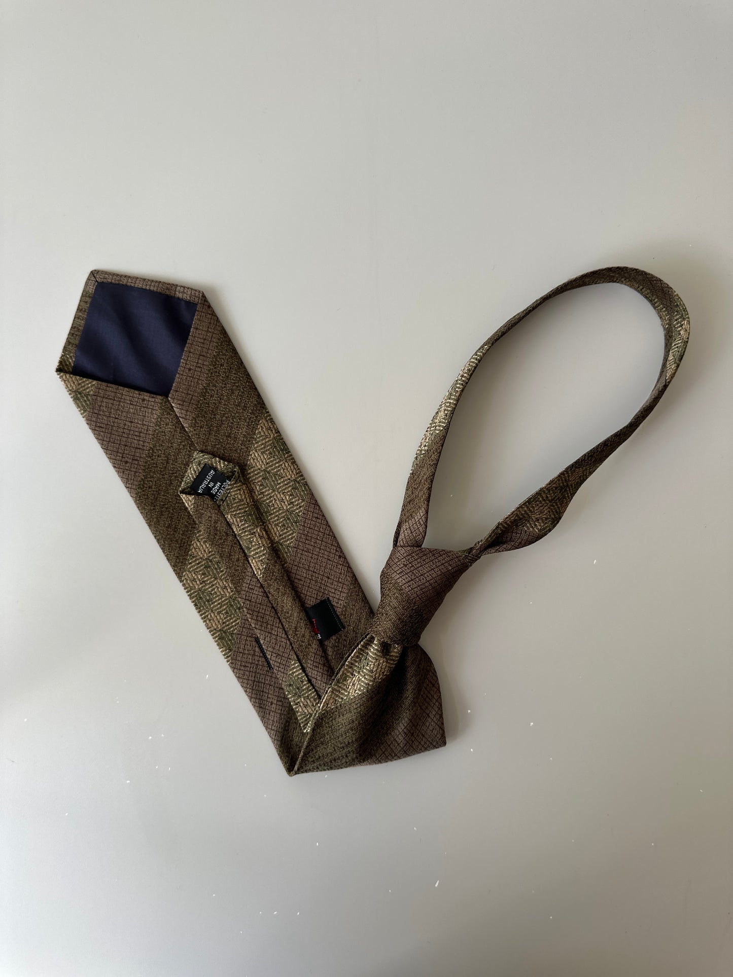 brown diagonal striped tie