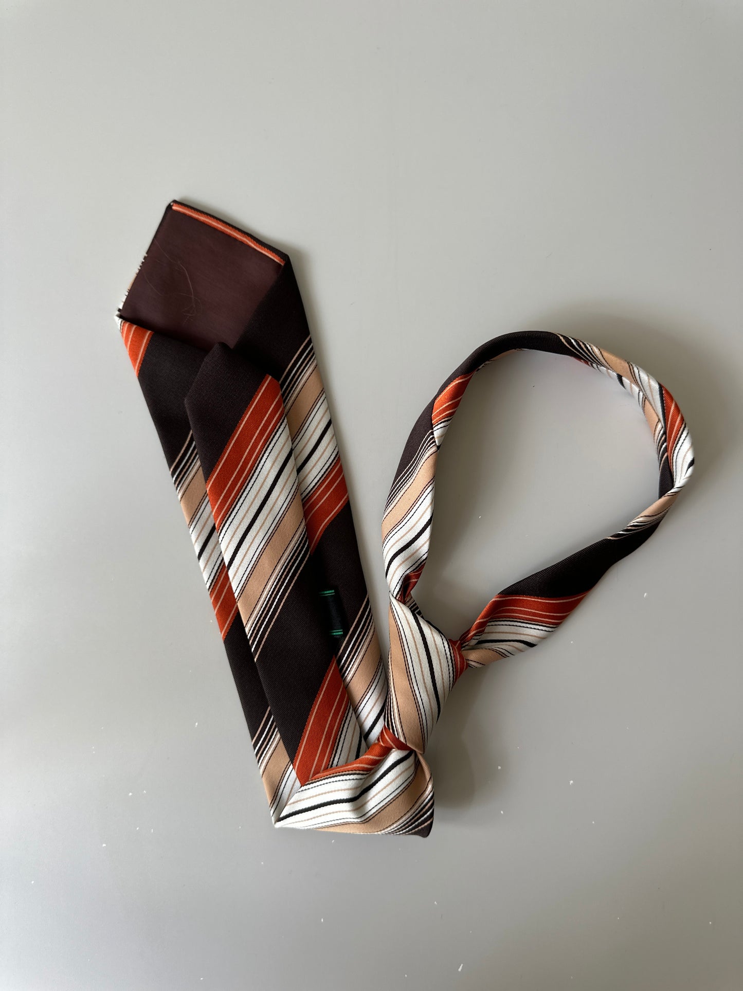 orange diagonal striped tie