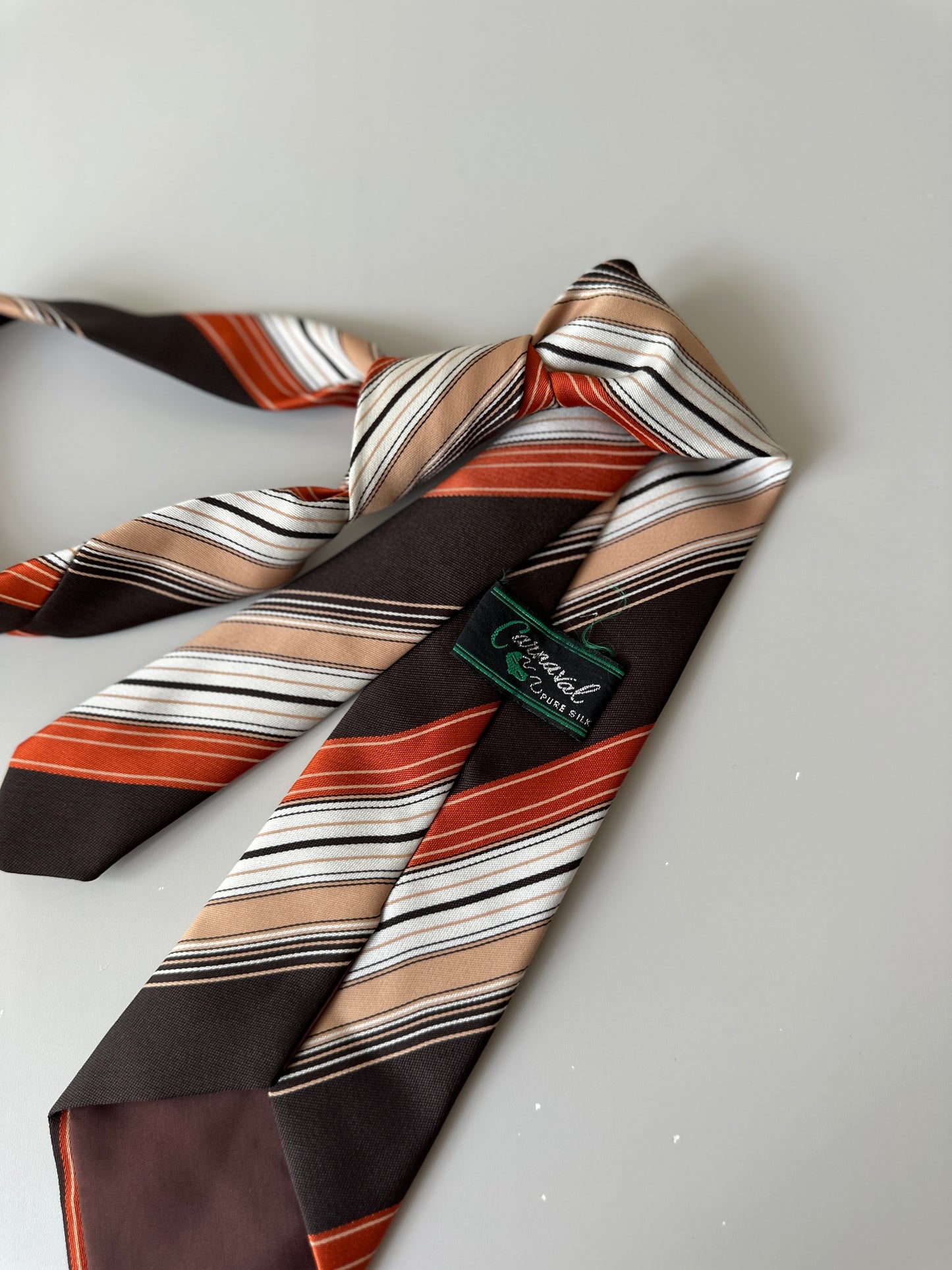 orange diagonal striped tie