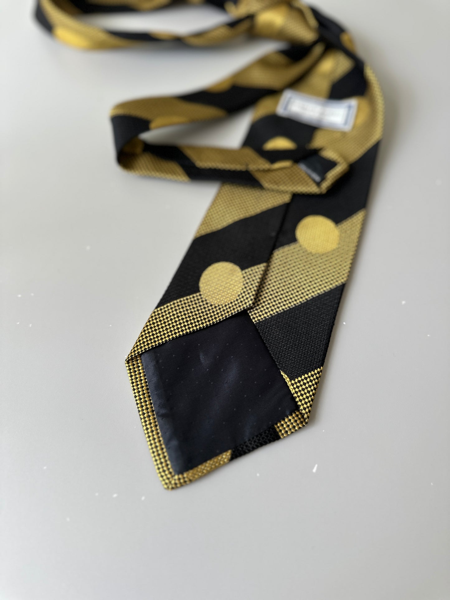 yellow/black polka dot tie