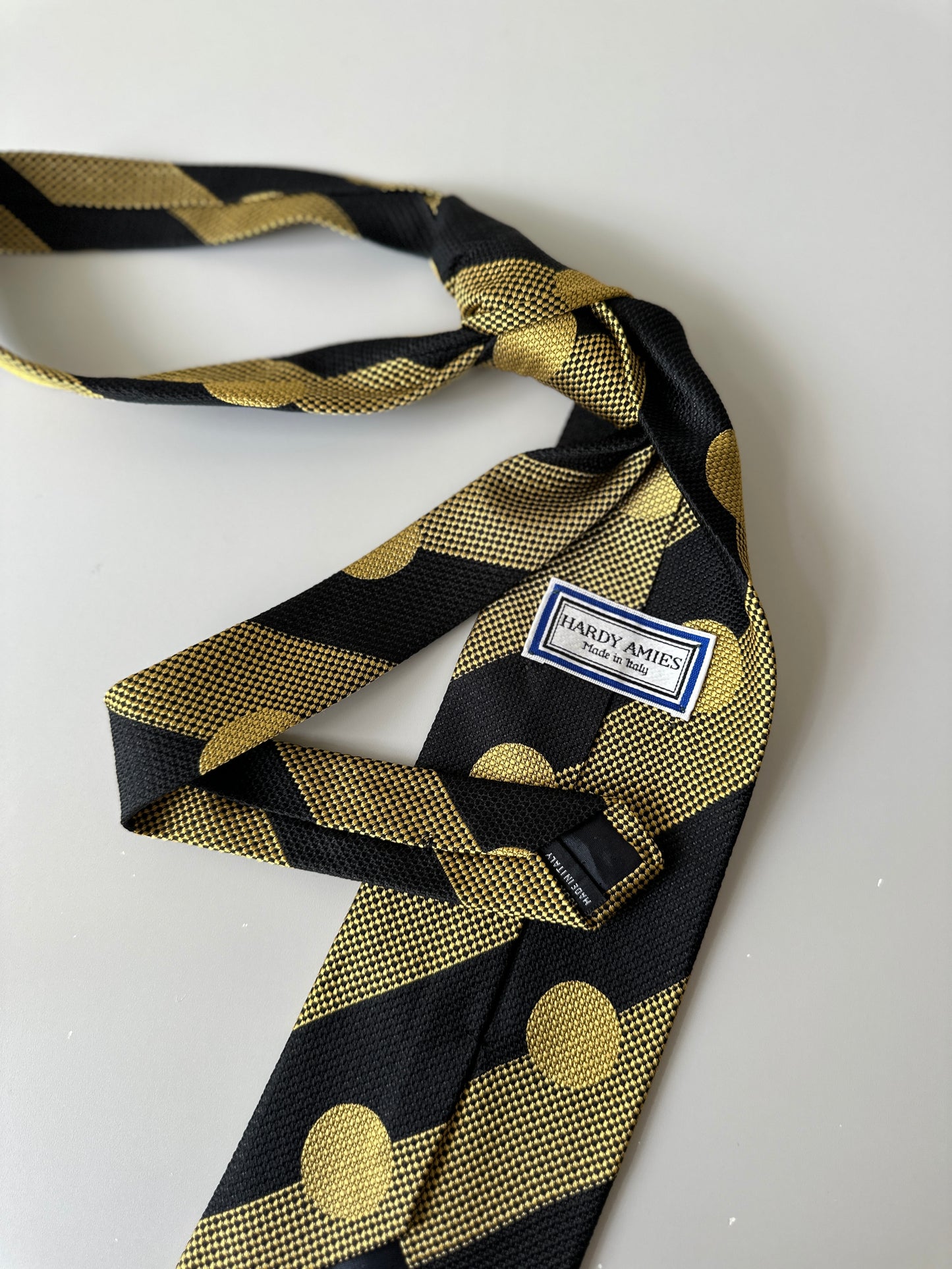 yellow/black polka dot tie