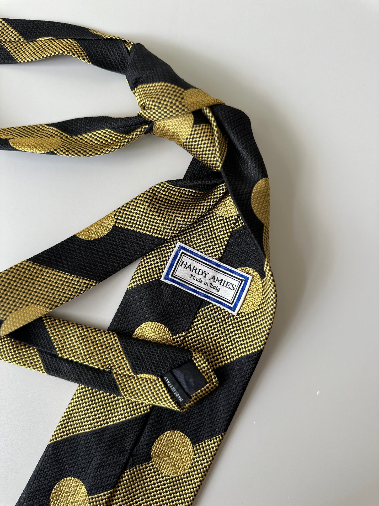 yellow/black polka dot tie