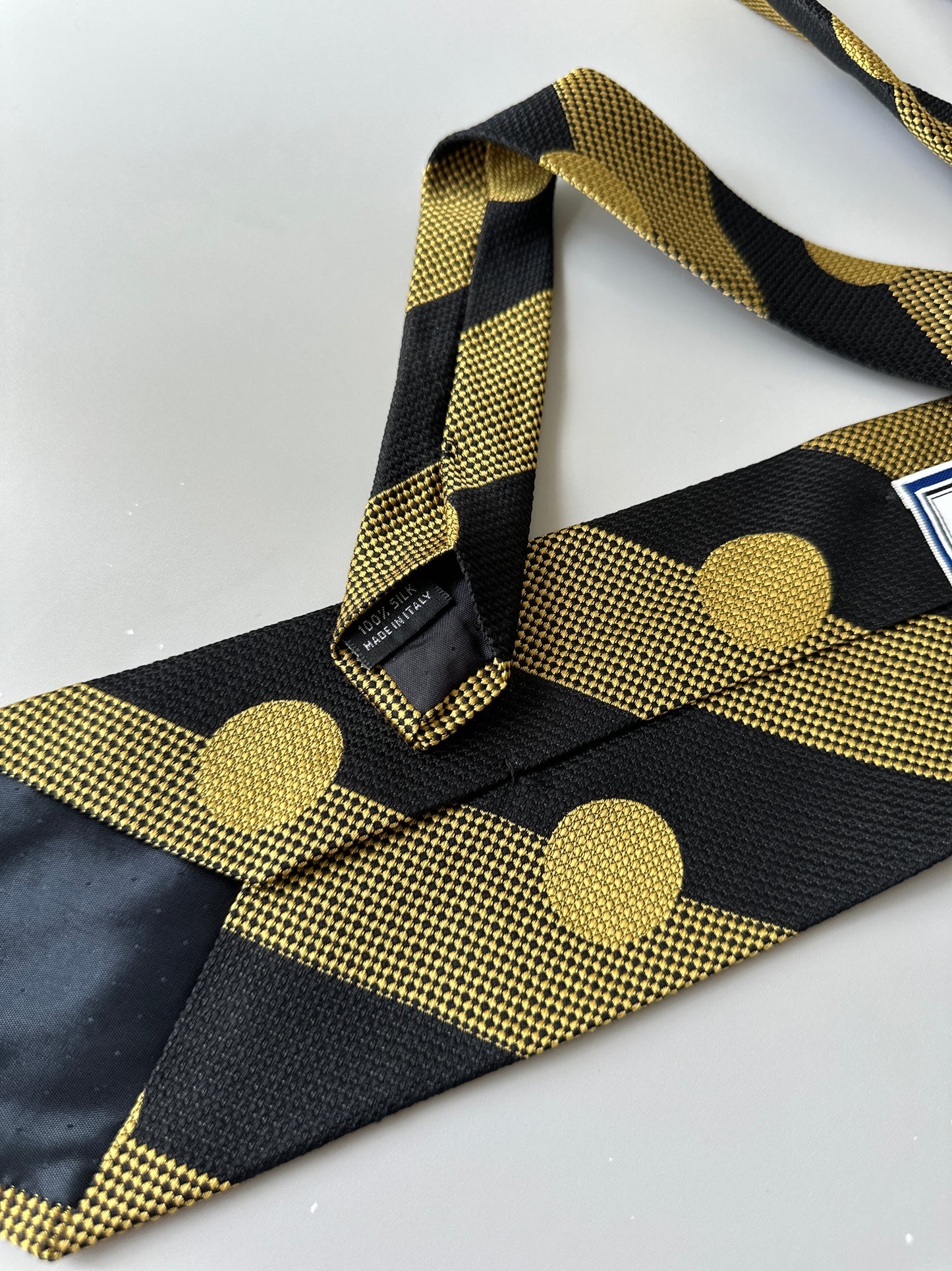 yellow/black polka dot tie