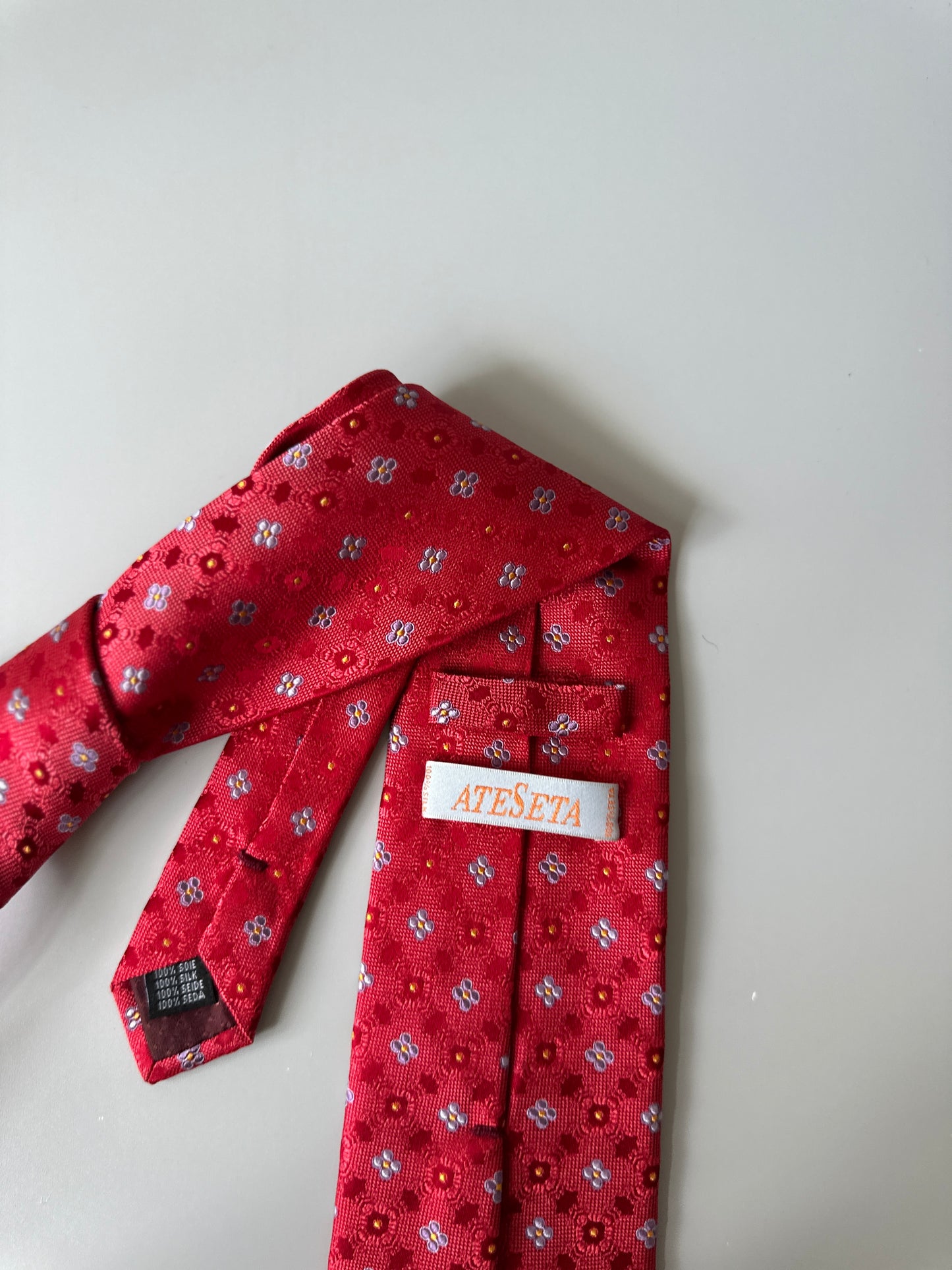 red with baby blue flowers tie