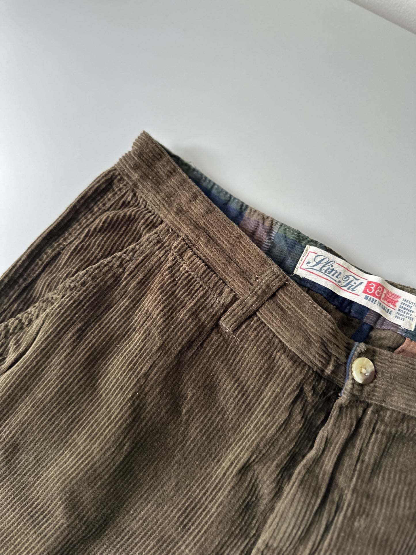 khaki corduroy trousers