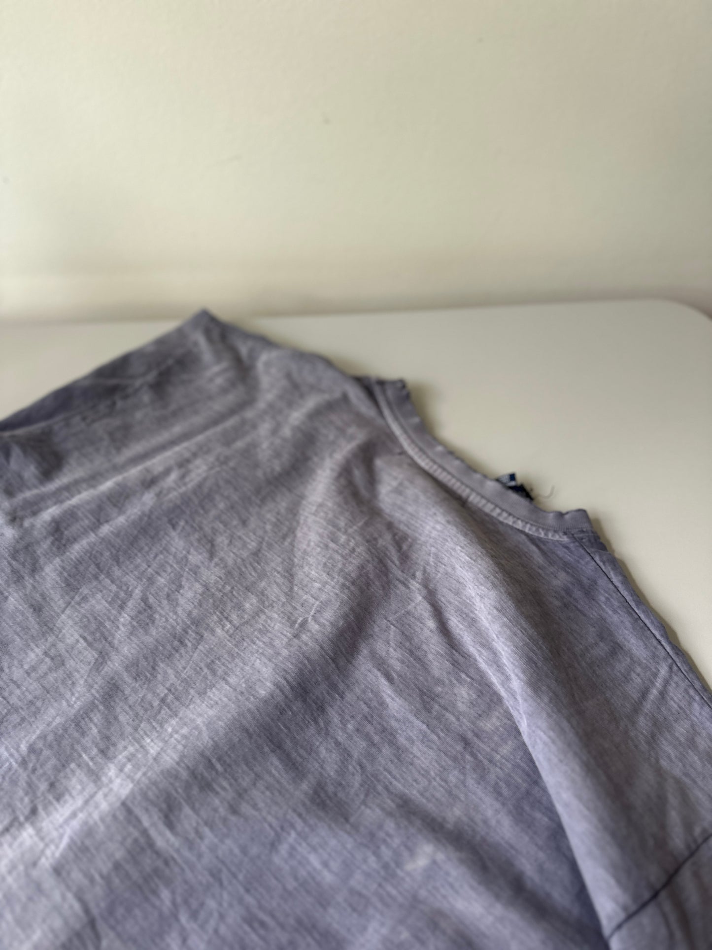 faded paint stained tee shirt