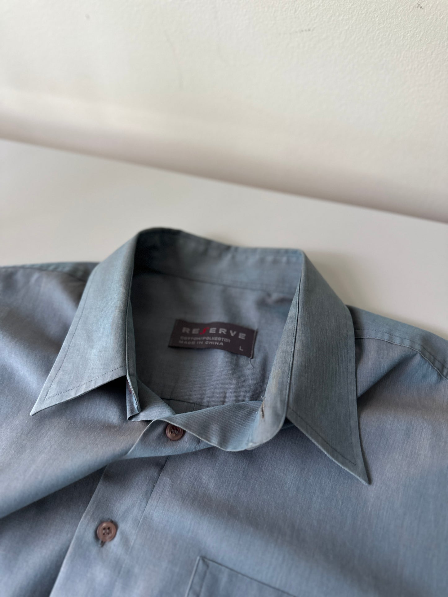 blue opaque button up