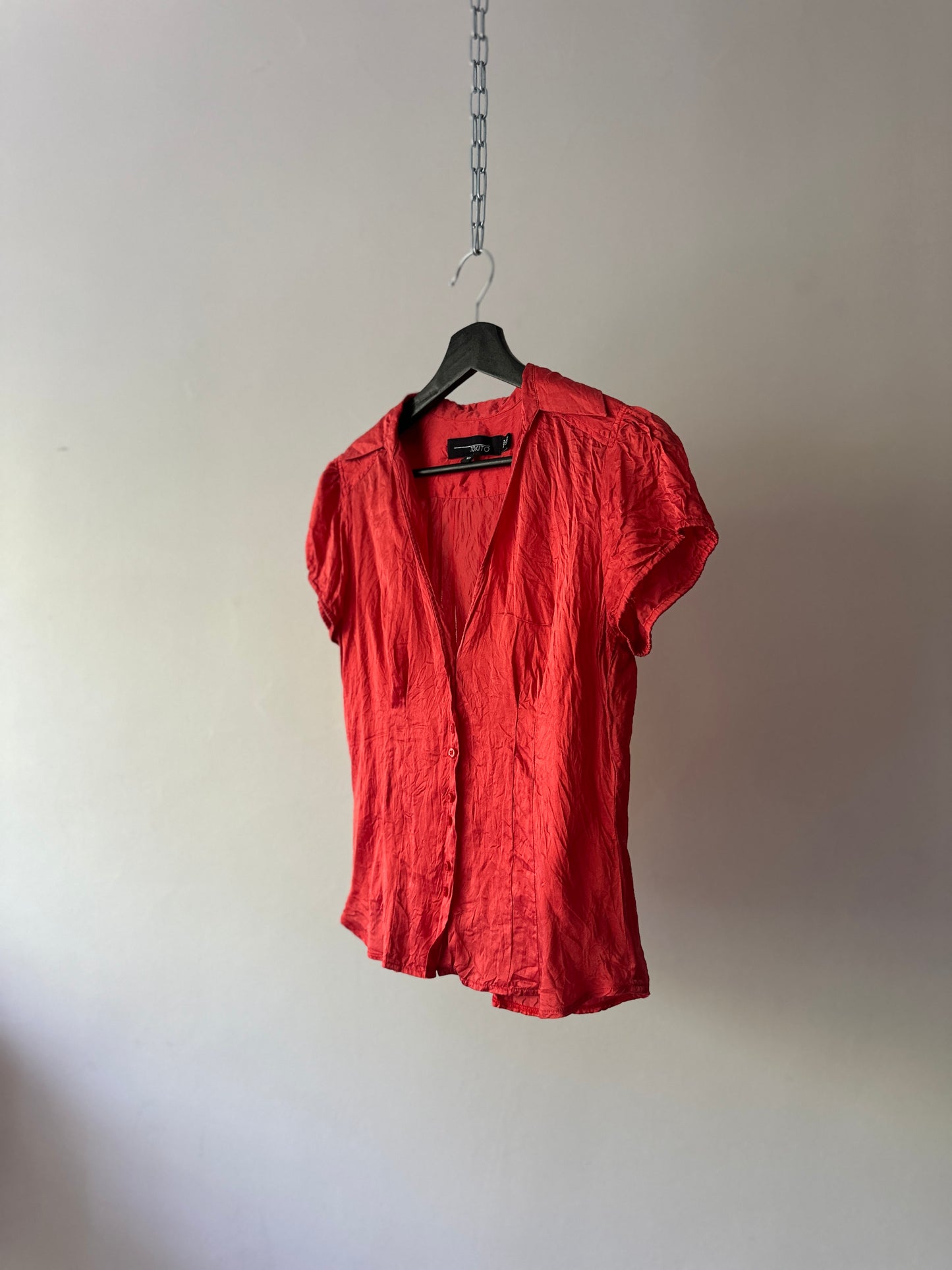 red silk blouse
