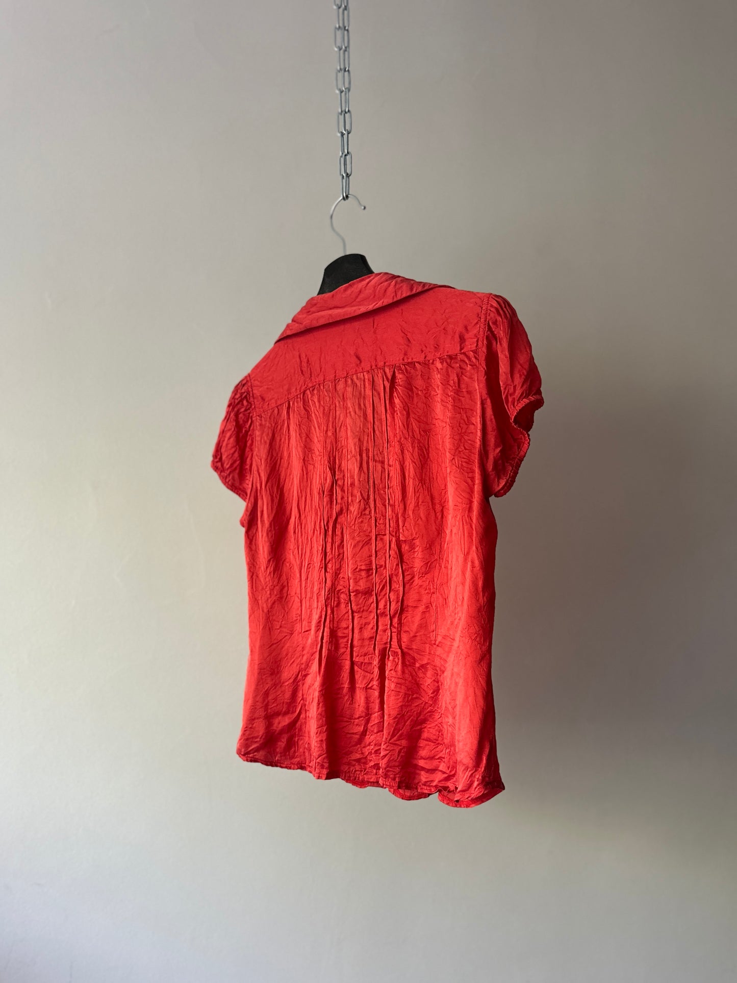red silk blouse