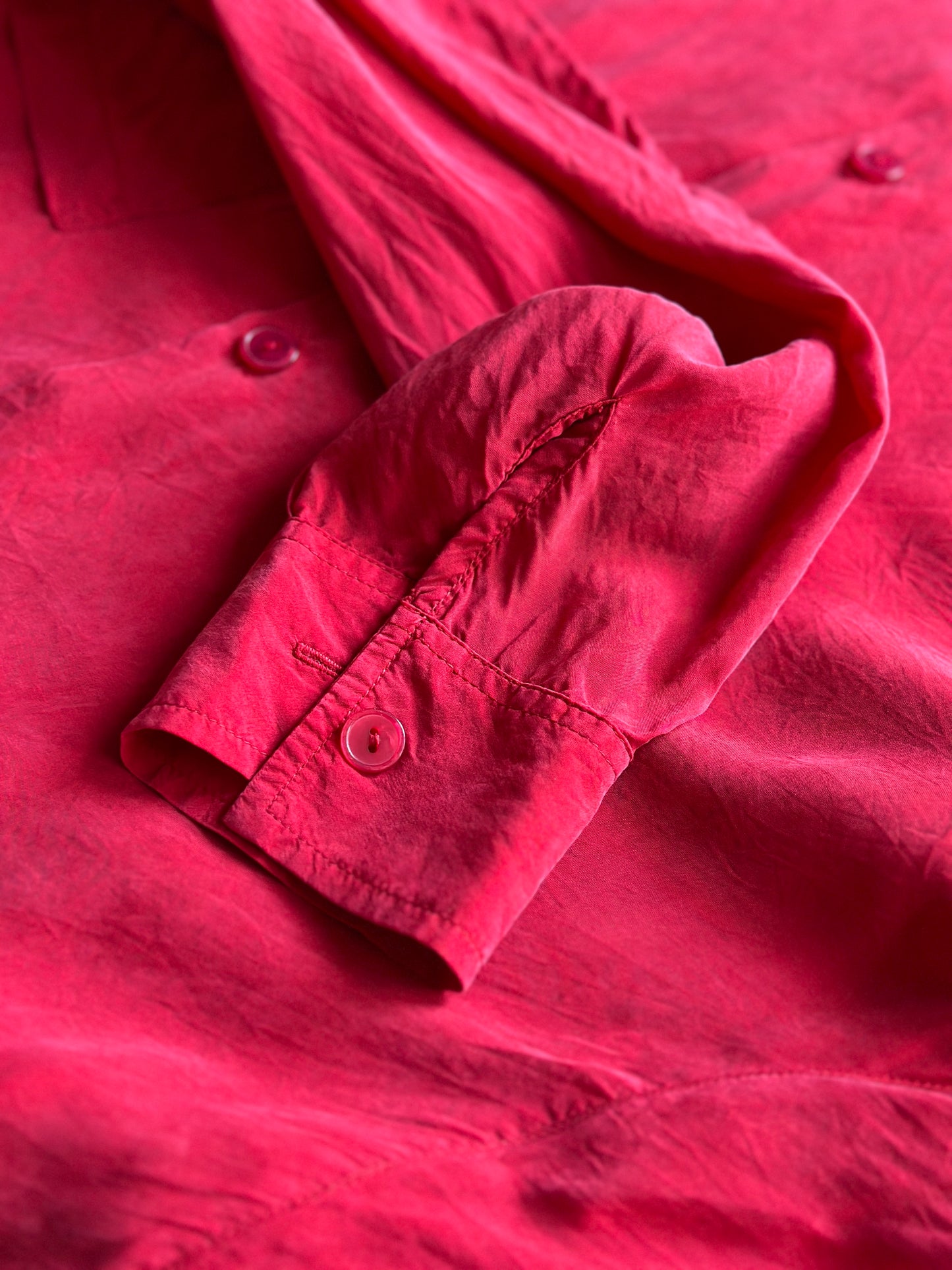 vibrant red silk shirt