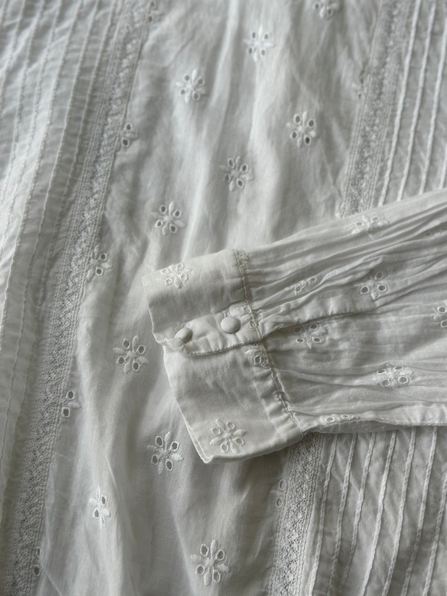 white embroidered cotton blouse