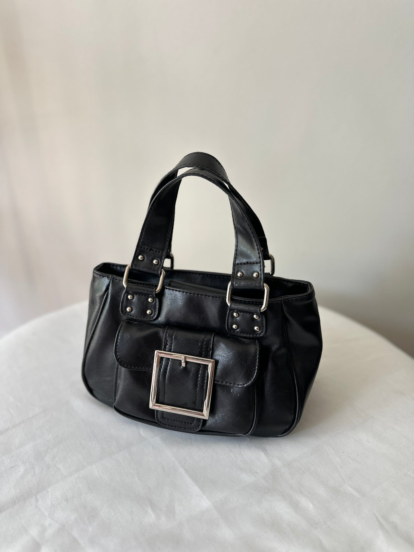 black buckle handbag