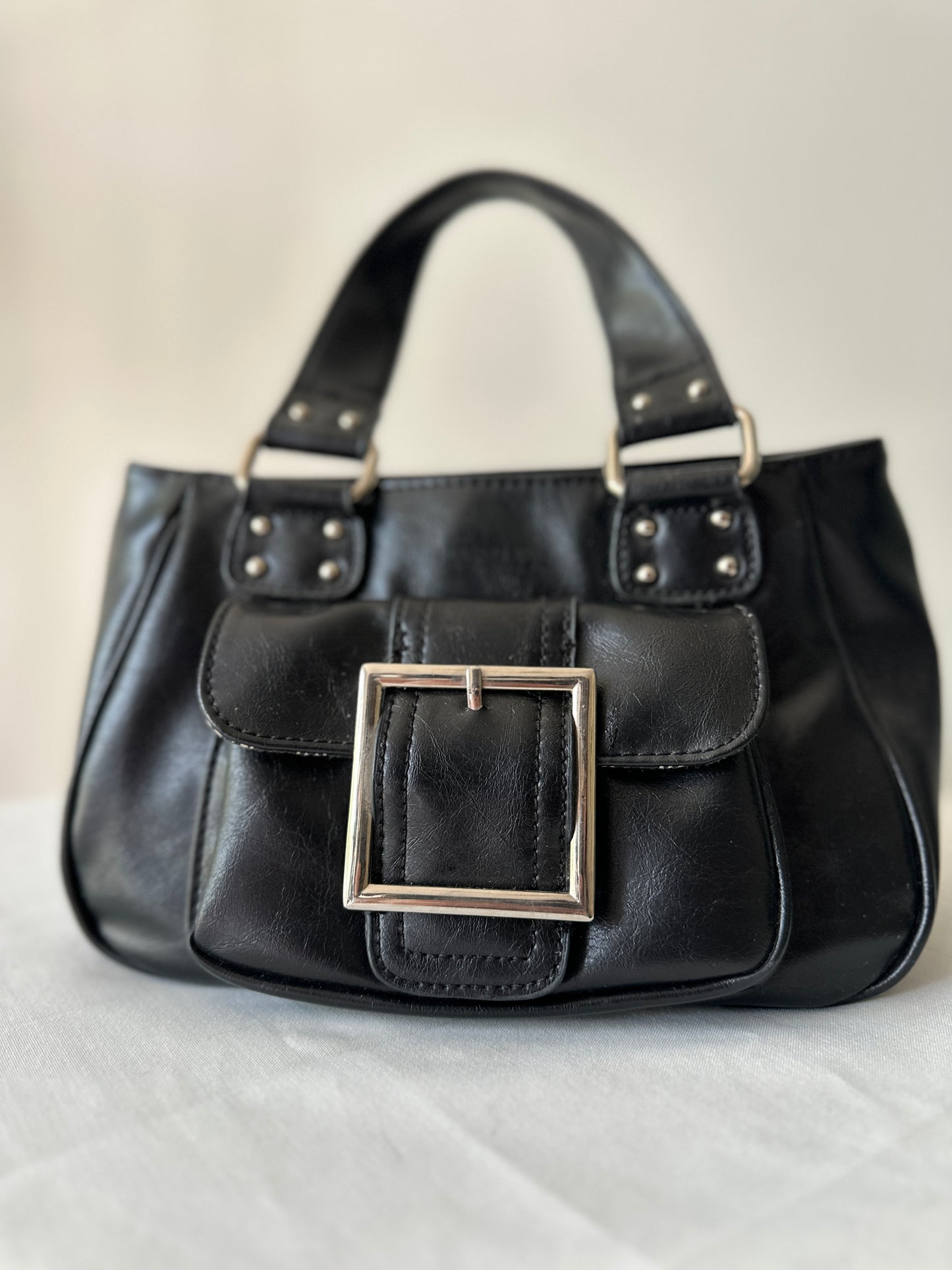 black buckle handbag