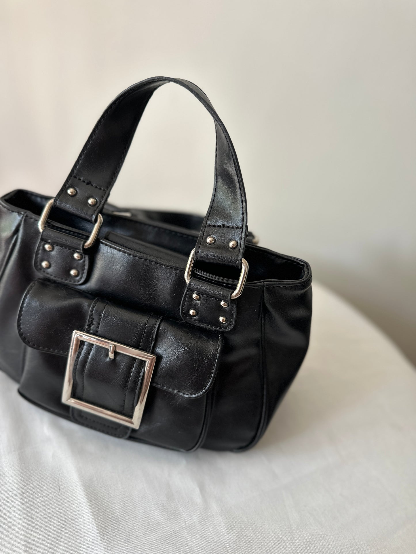 black buckle handbag