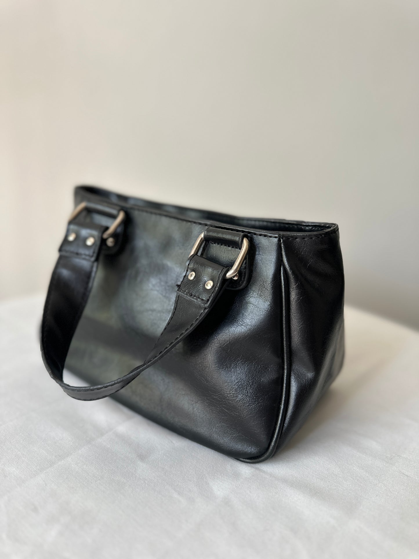 black buckle handbag