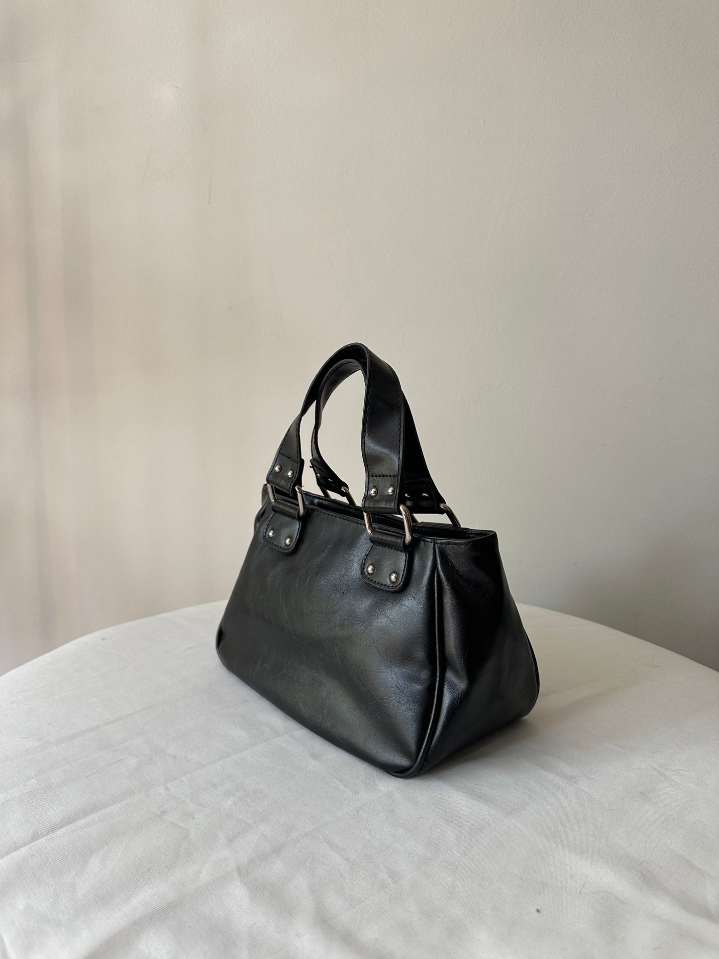 black buckle handbag