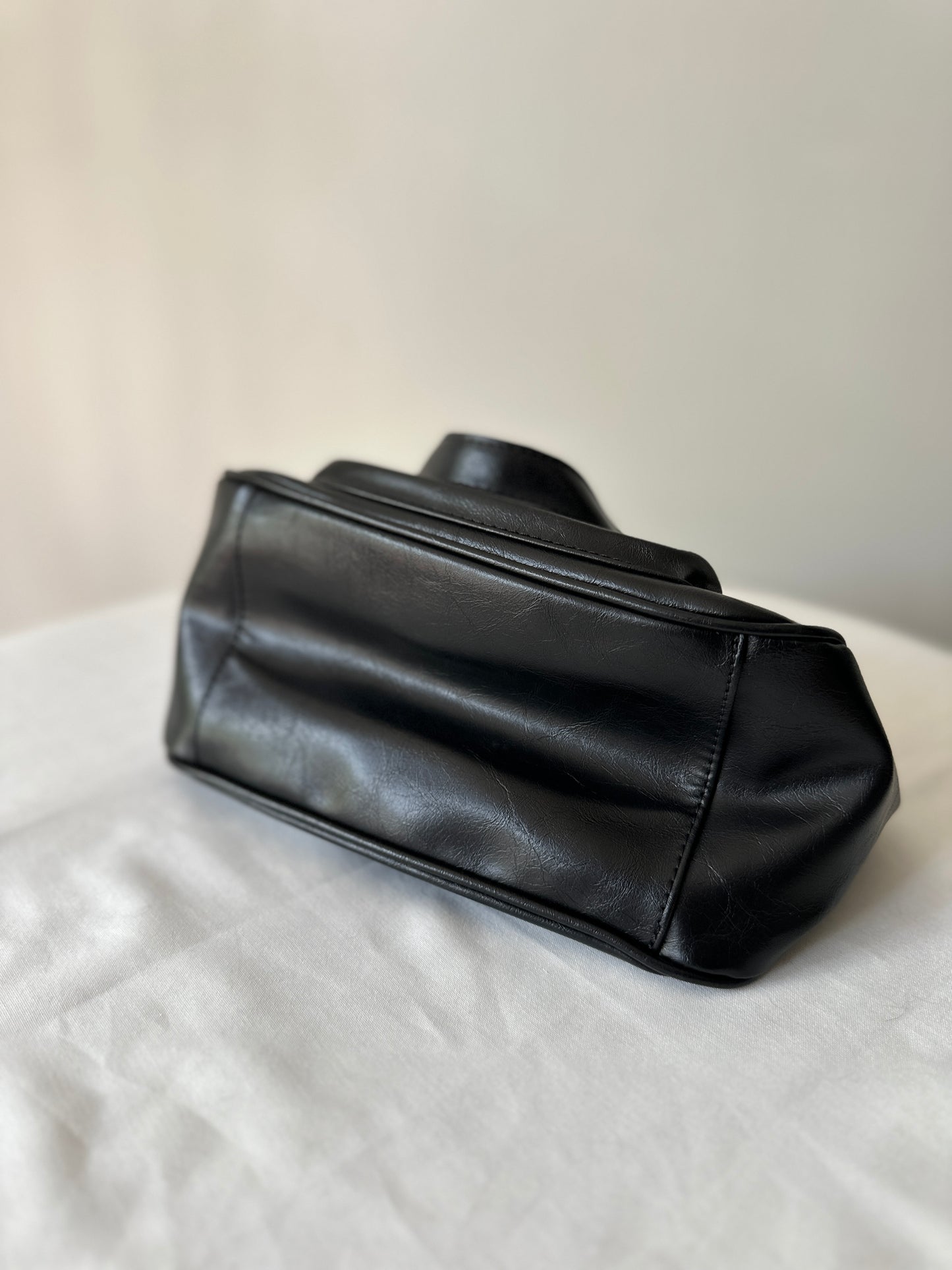 black buckle handbag
