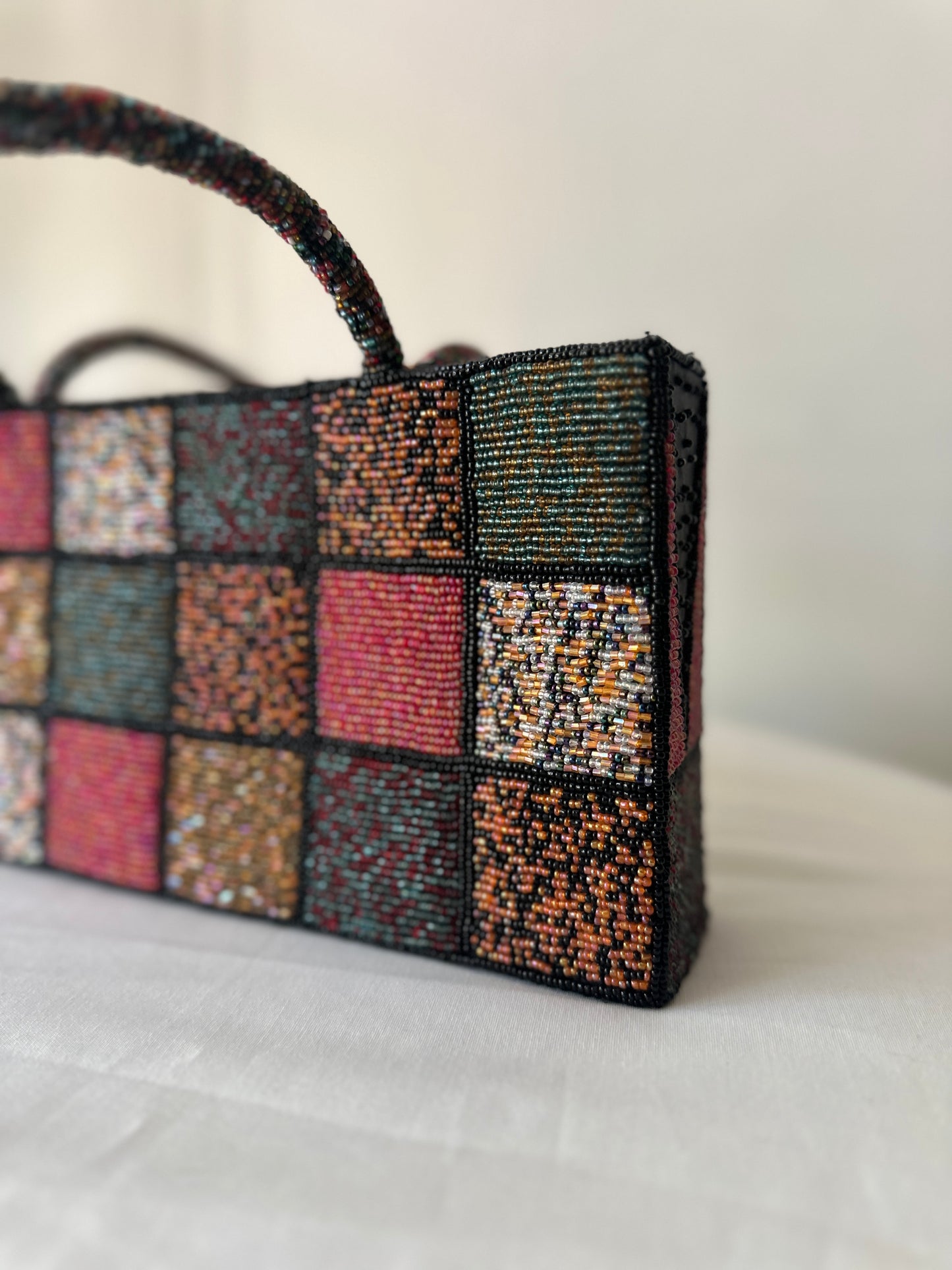 checkered beaded handbag
