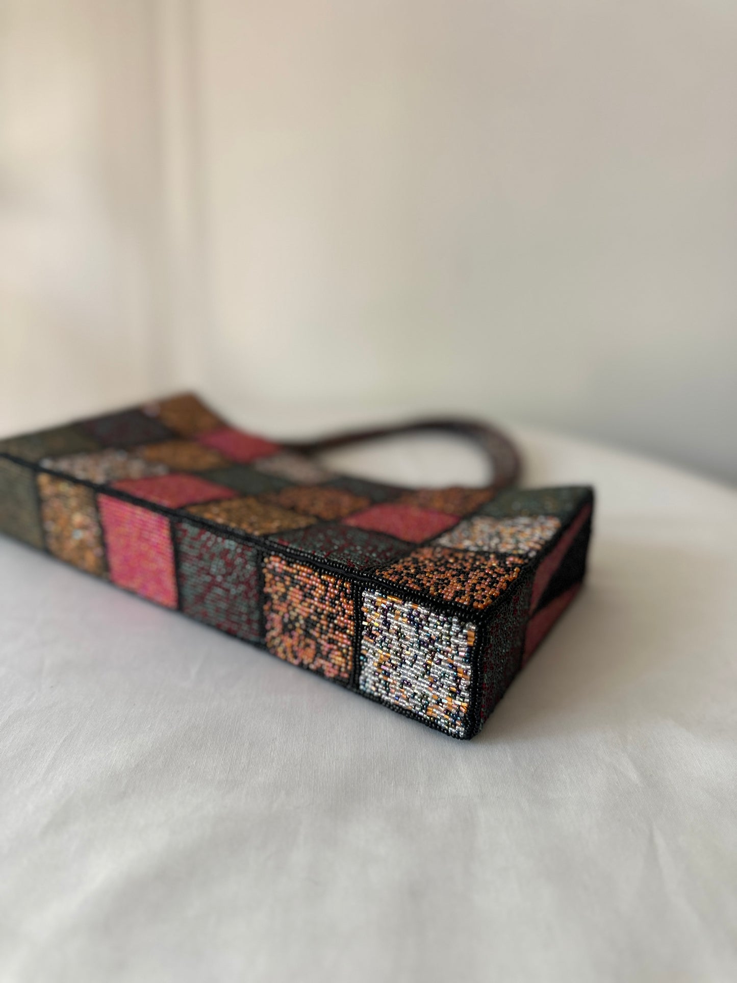 checkered beaded handbag