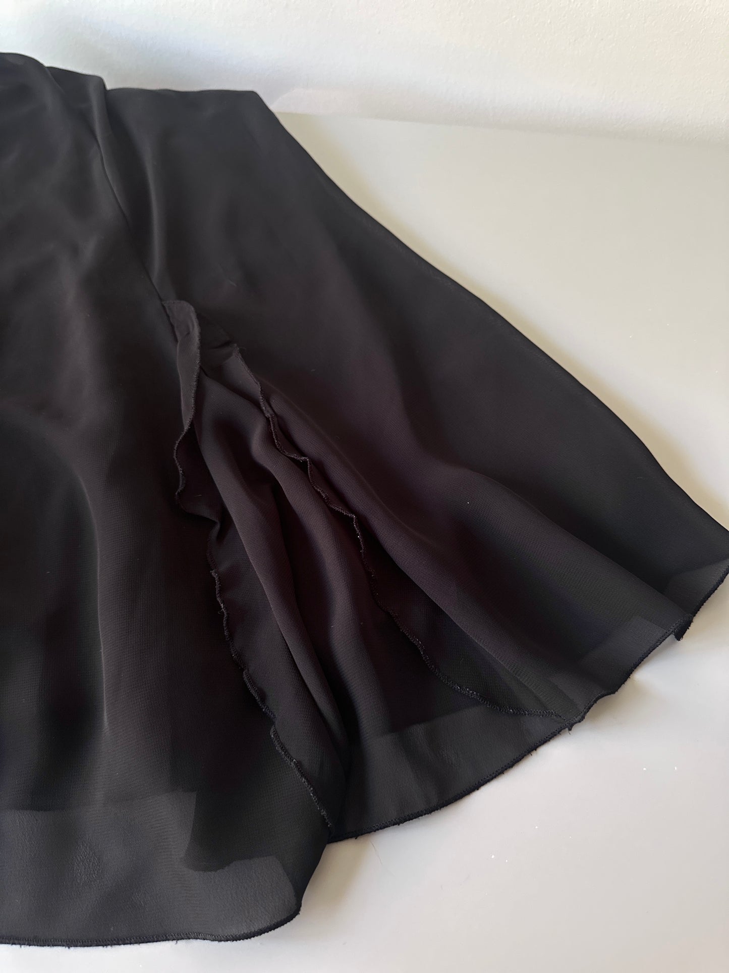 black ruffled midi skirt