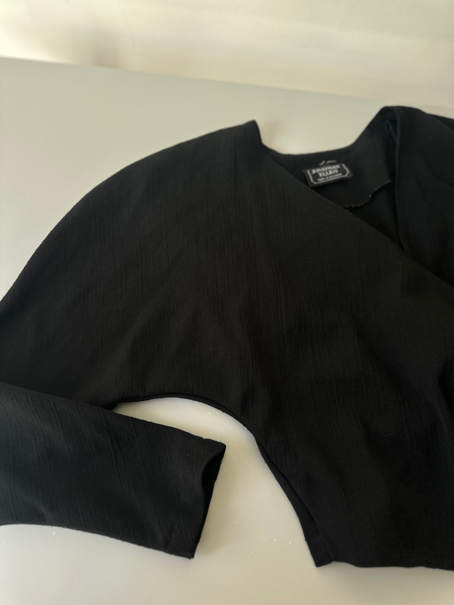 cropped cross over long sleeve blouse