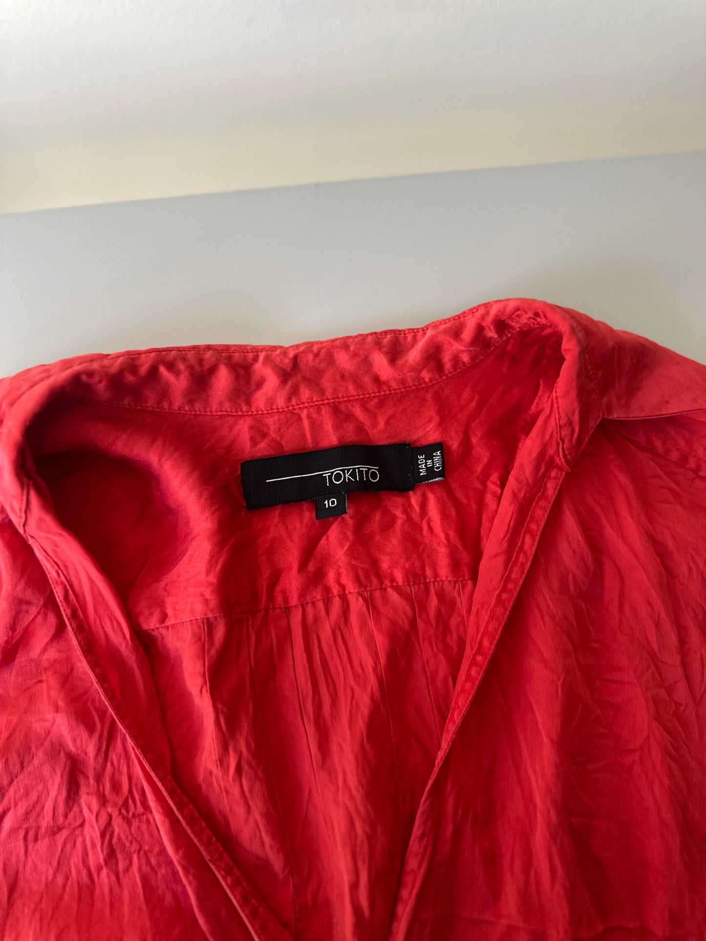 red silk blouse