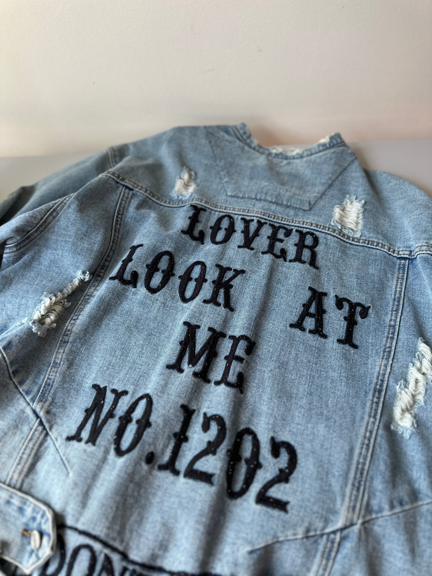 distressed denim jacket