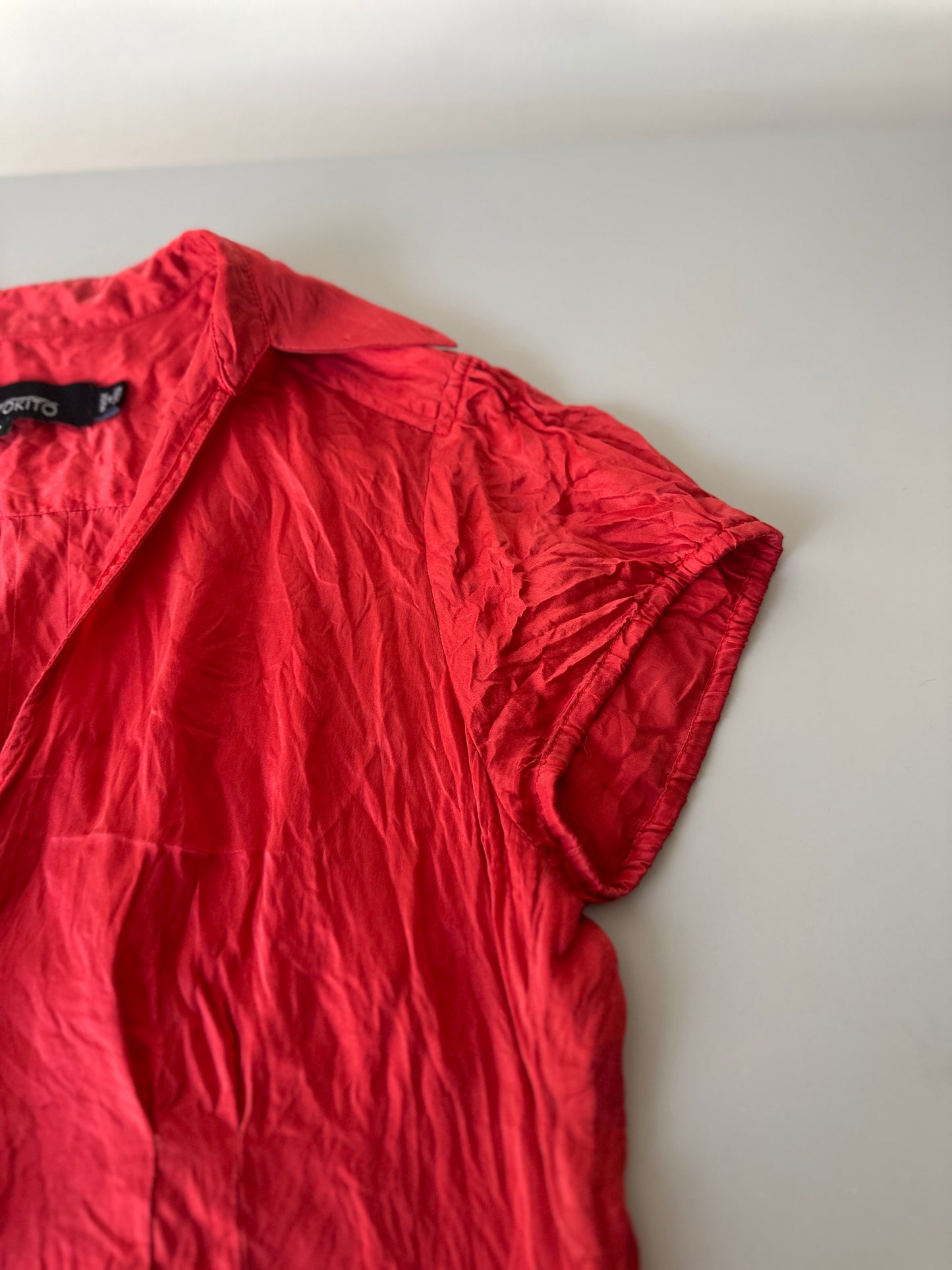 red silk blouse