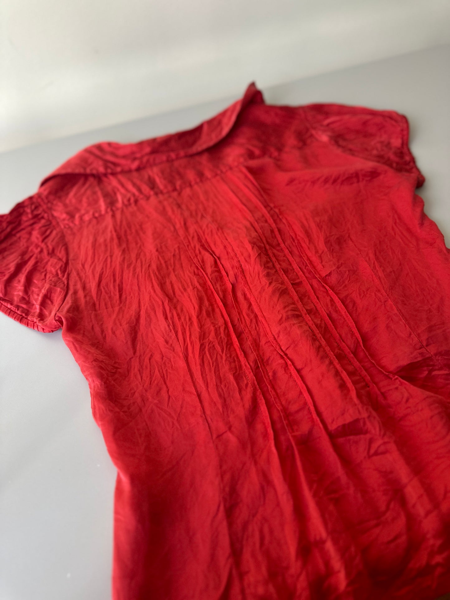 red silk blouse