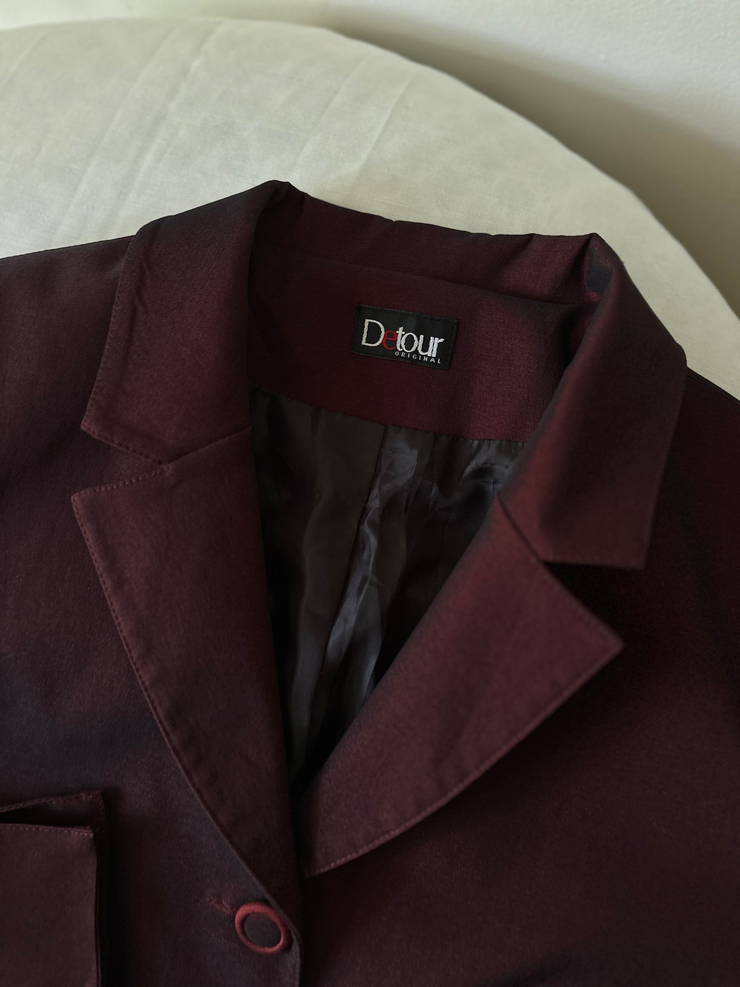 opaque red suit jacket