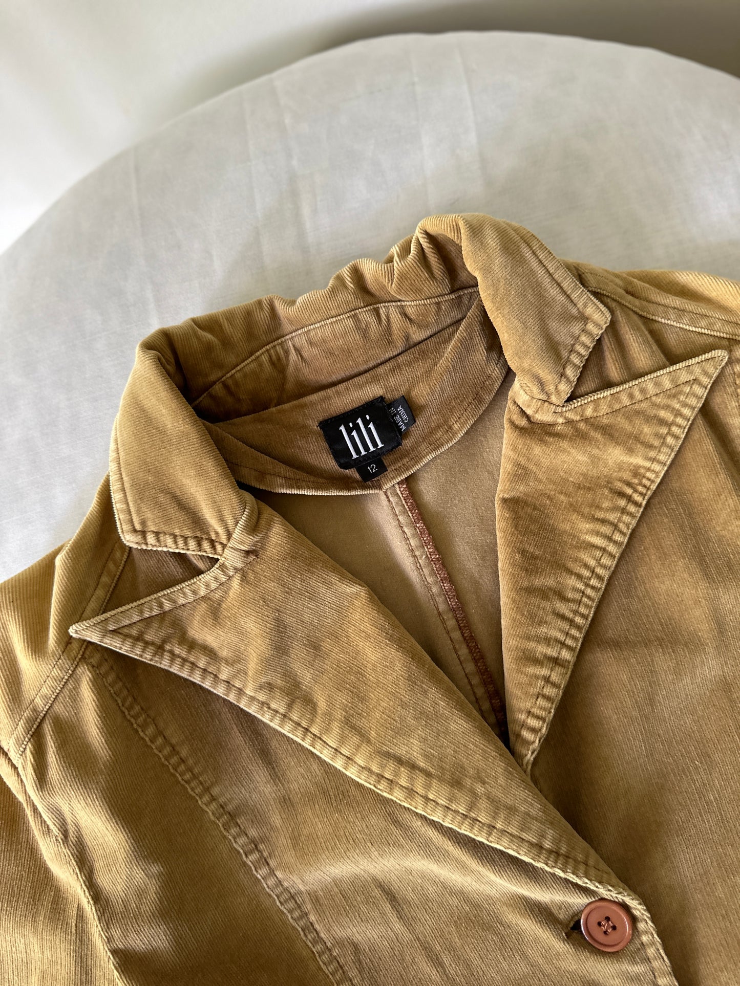 camel coloured corduroy mid trench coat