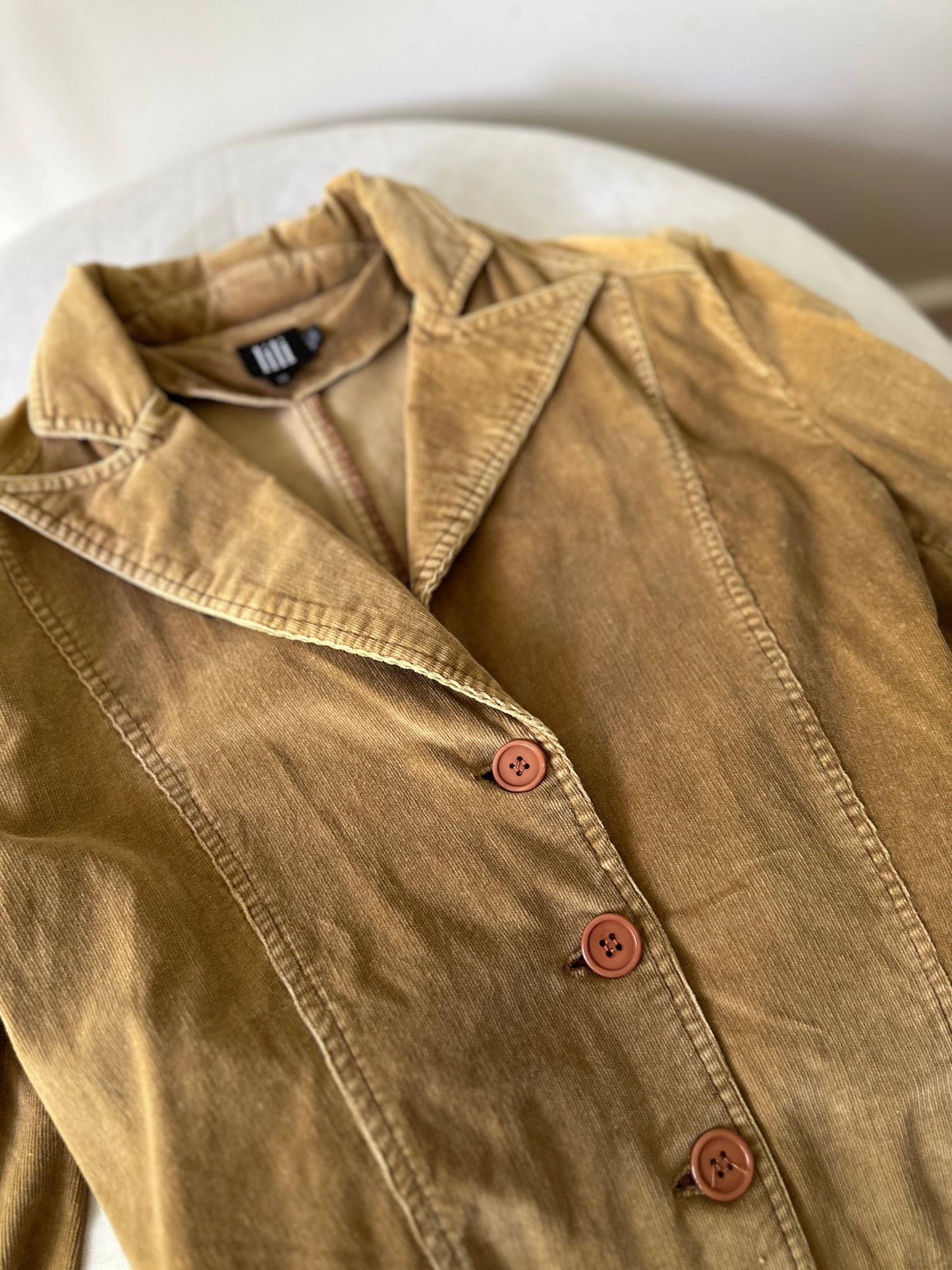 camel coloured corduroy mid trench coat