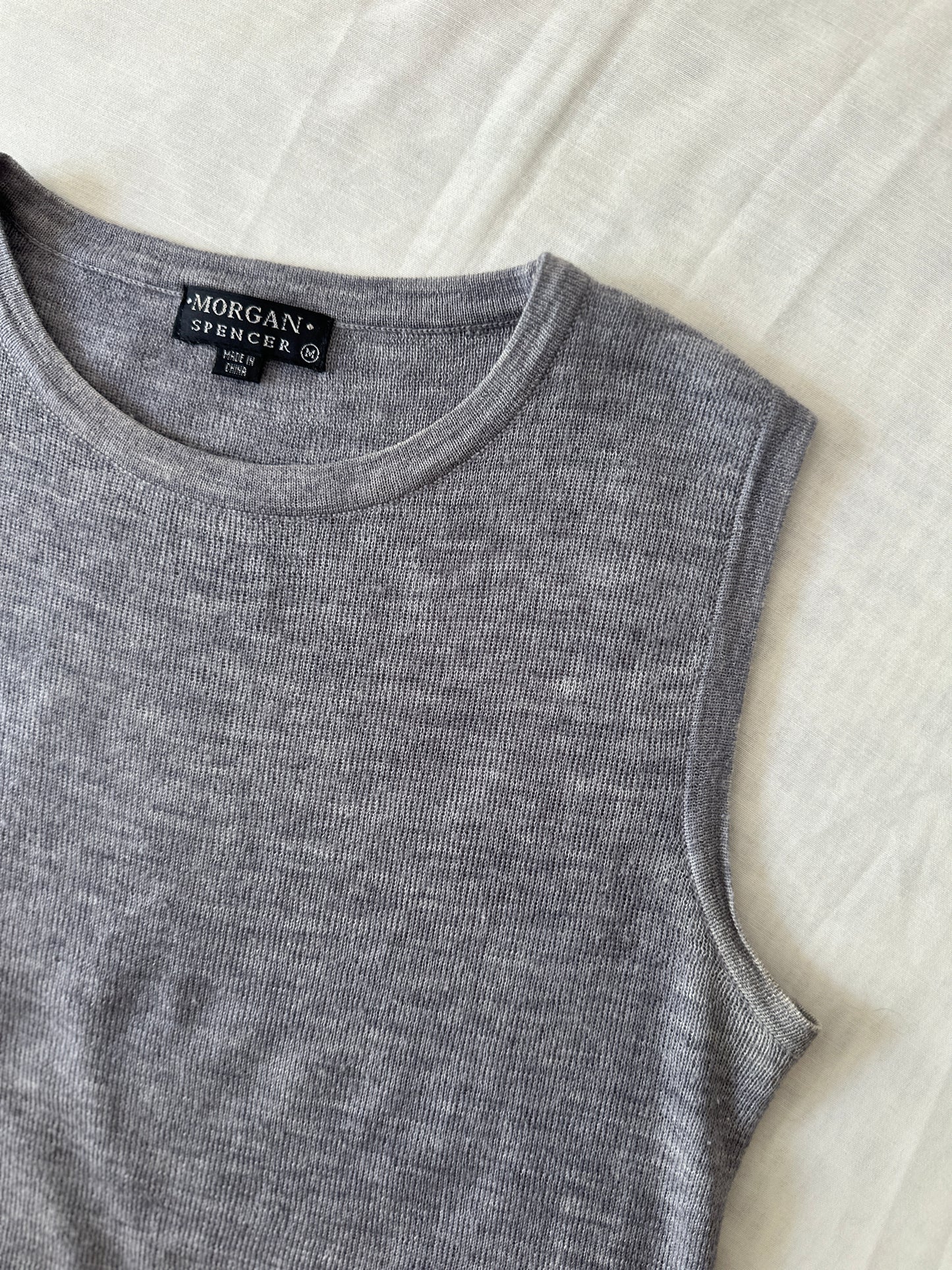 grey woollen vest