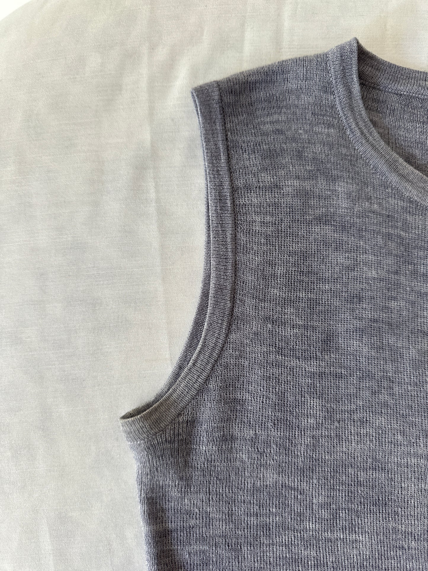 grey woollen vest