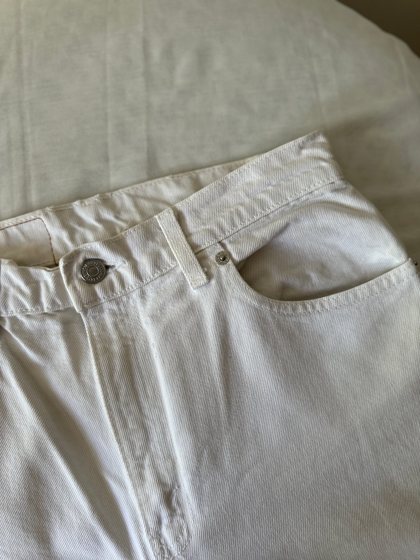 white Levi jeans