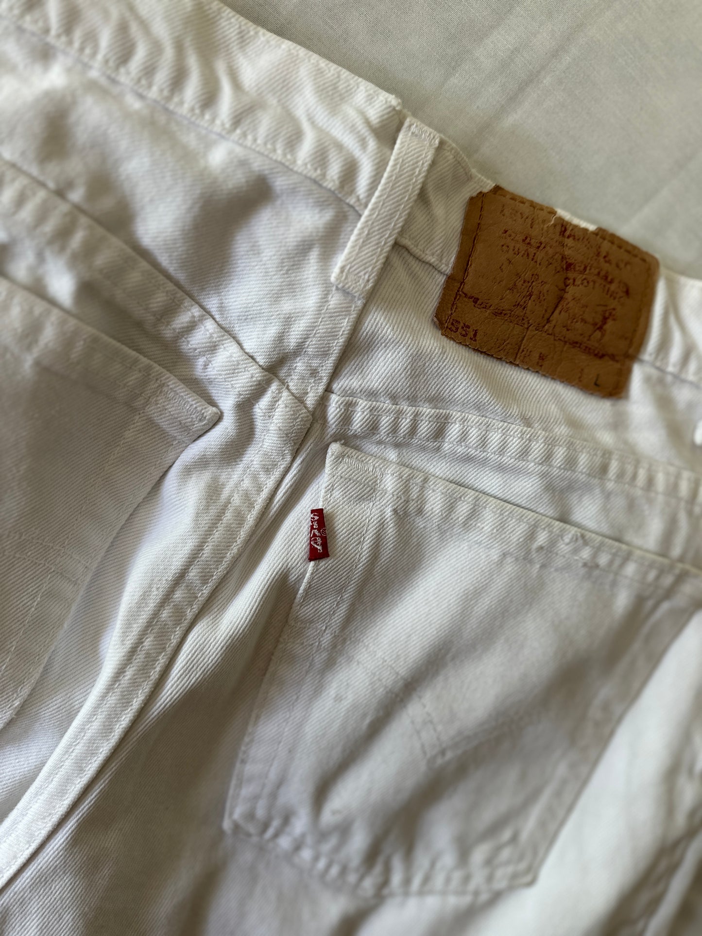 white Levi jeans