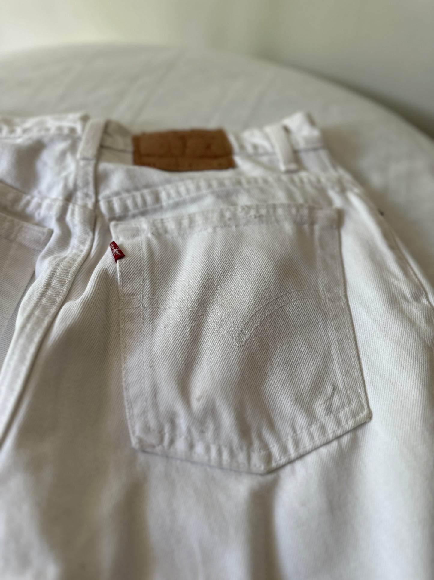 white Levi jeans