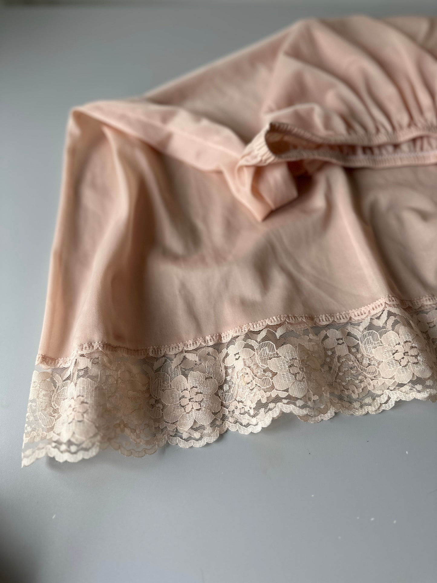 nude mid-length slip skirt