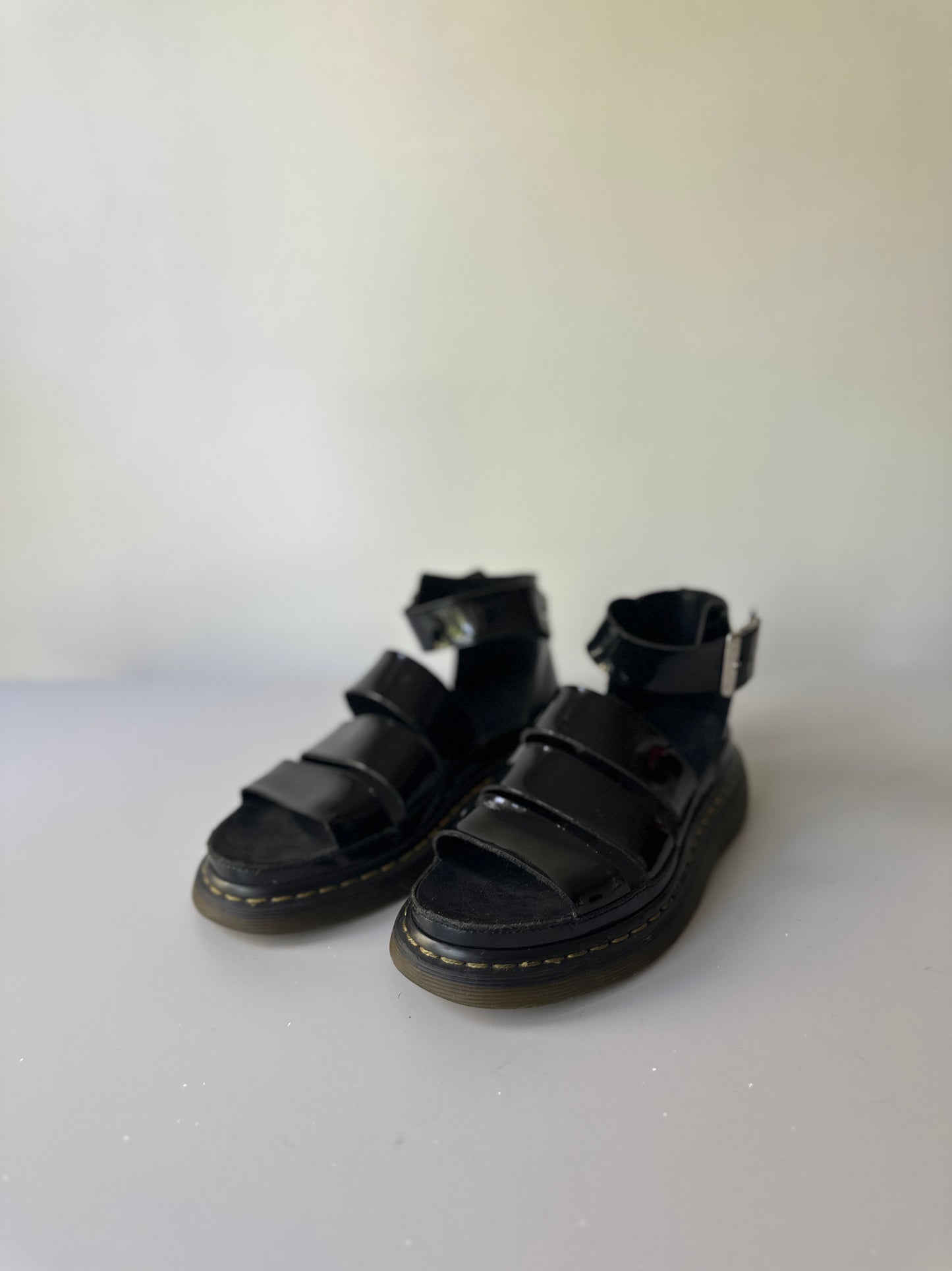 black patent Dr. Marten three strap sandals