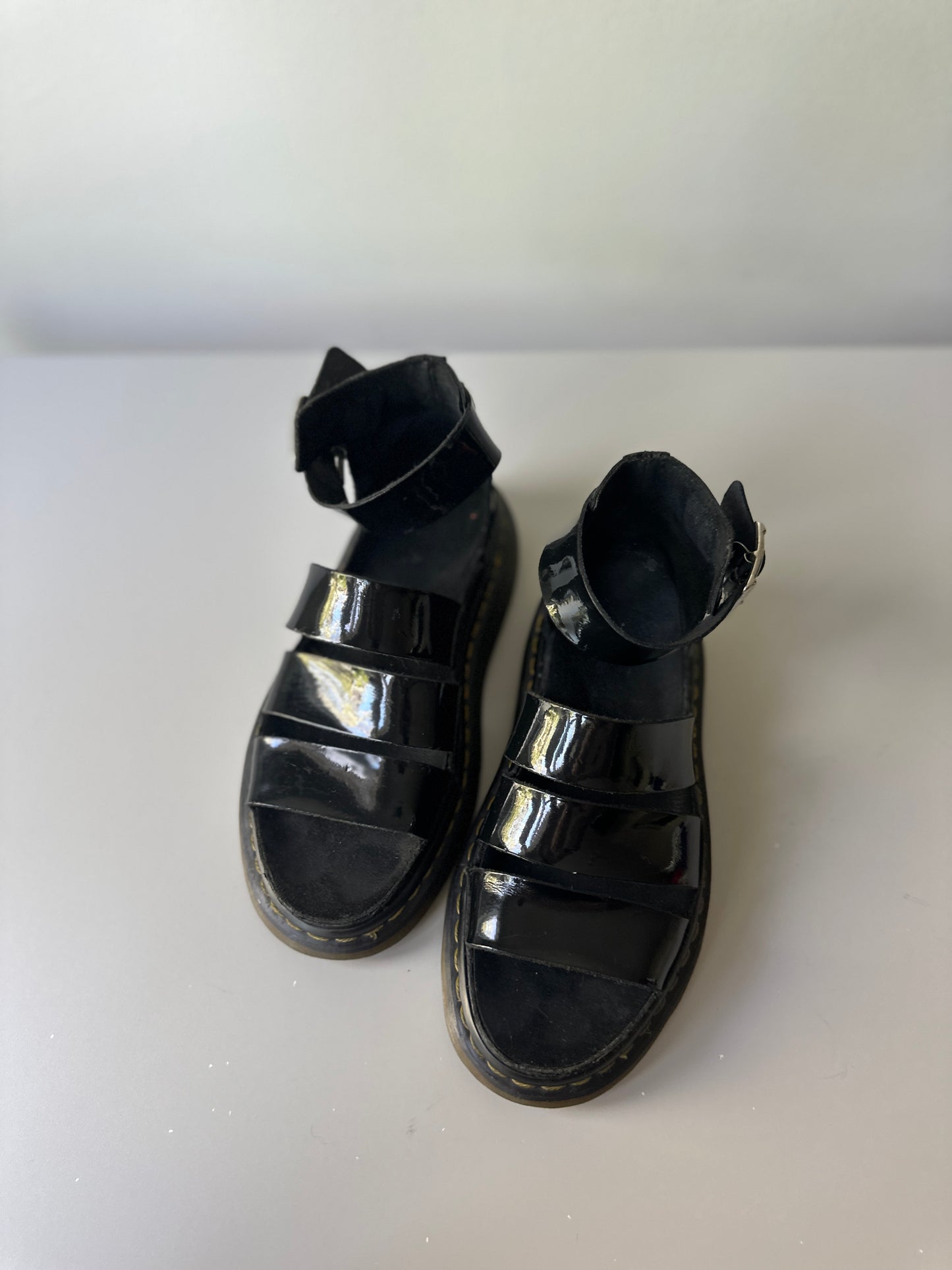 black patent Dr. Marten three strap sandals