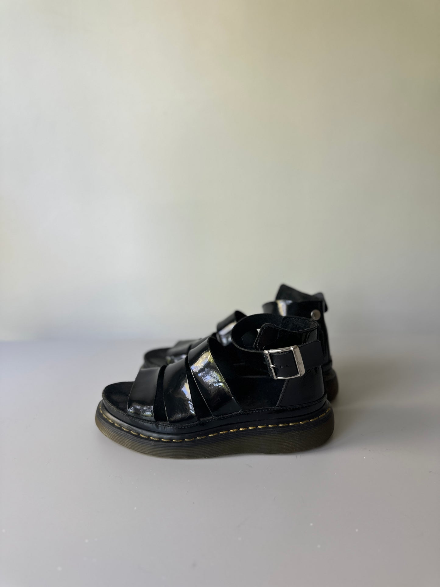 black patent Dr. Marten three strap sandals