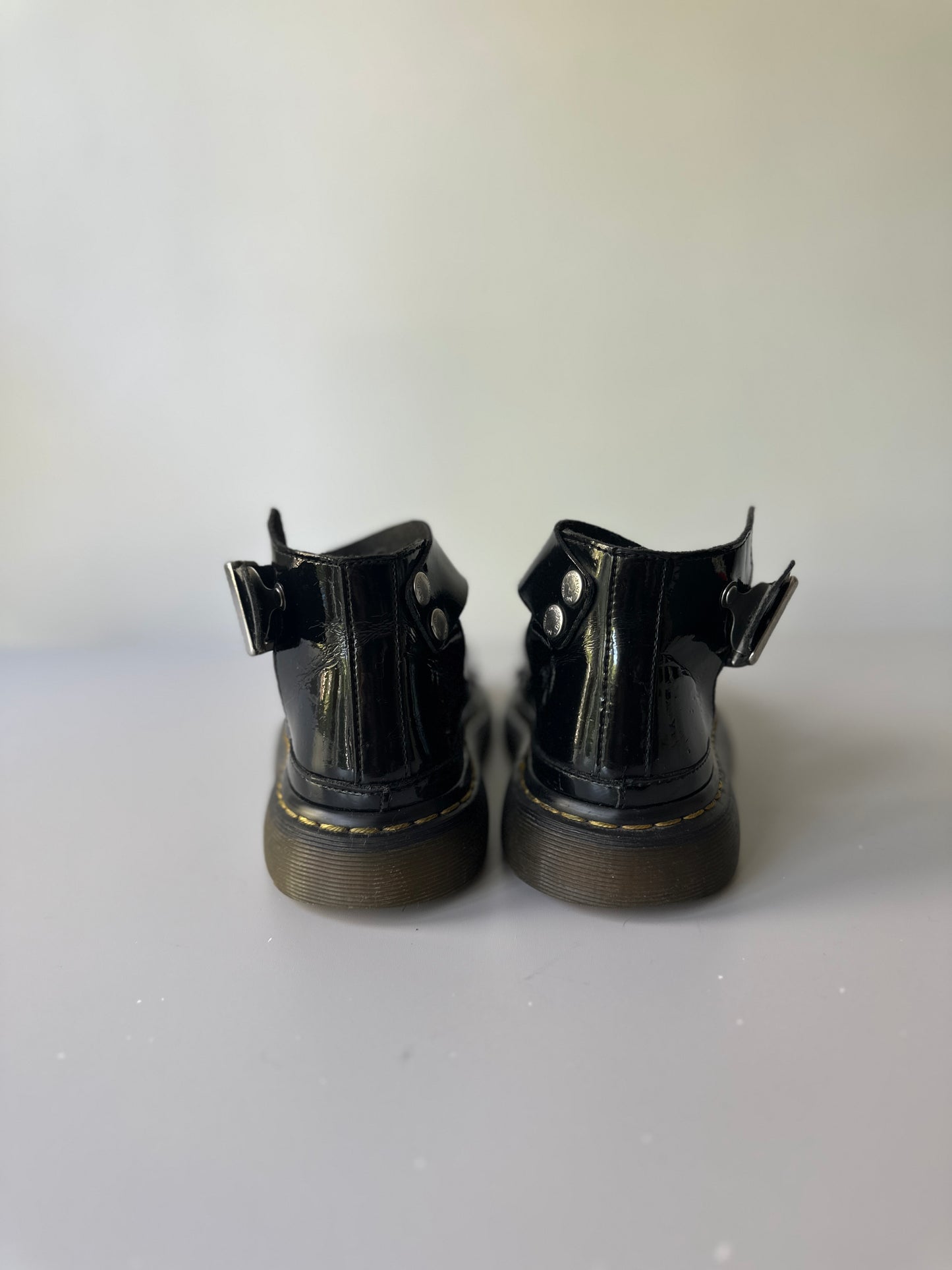 black patent Dr. Marten three strap sandals