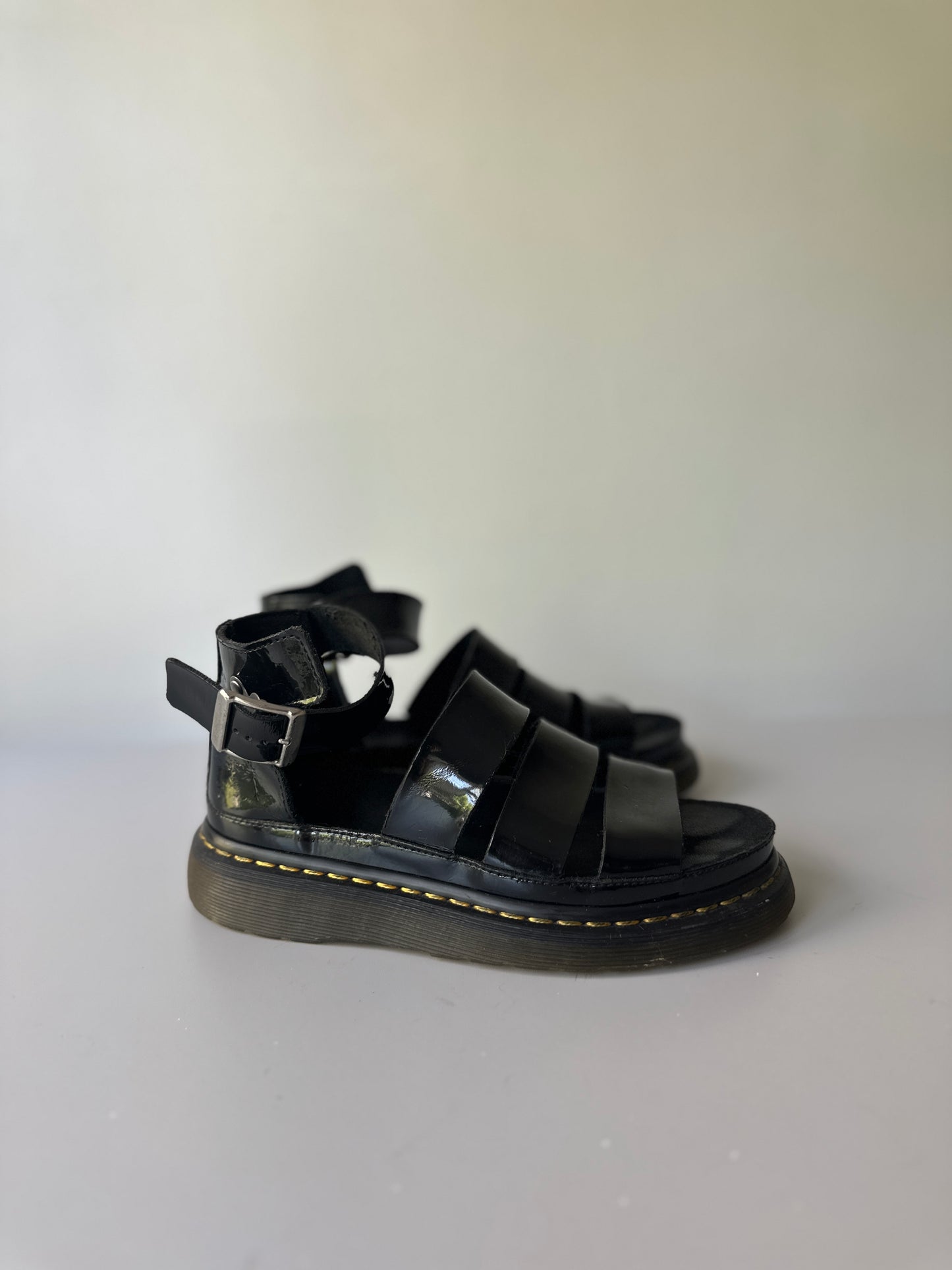 black patent Dr. Marten three strap sandals
