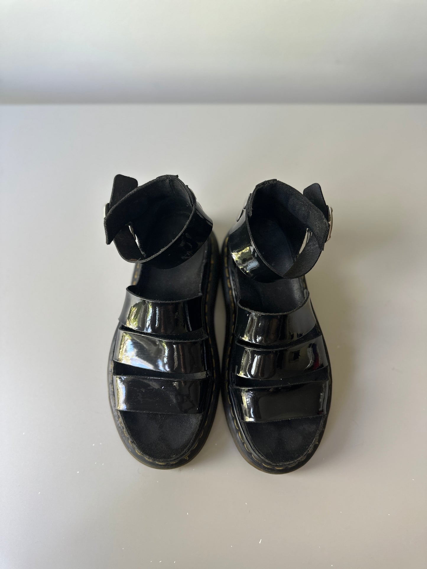 black patent Dr. Marten three strap sandals