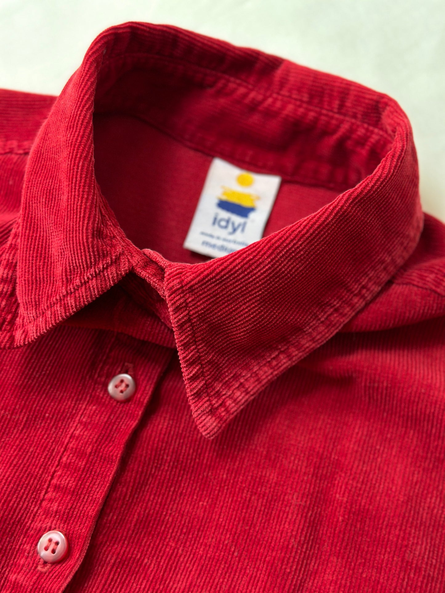 red corduroy button up
