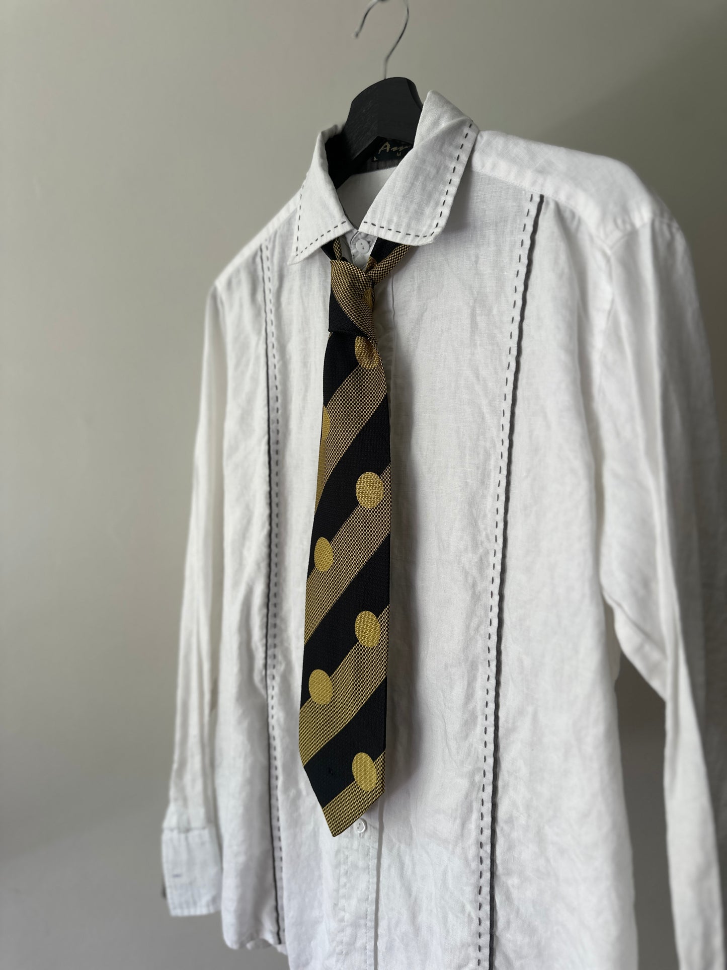 yellow/black polka dot tie
