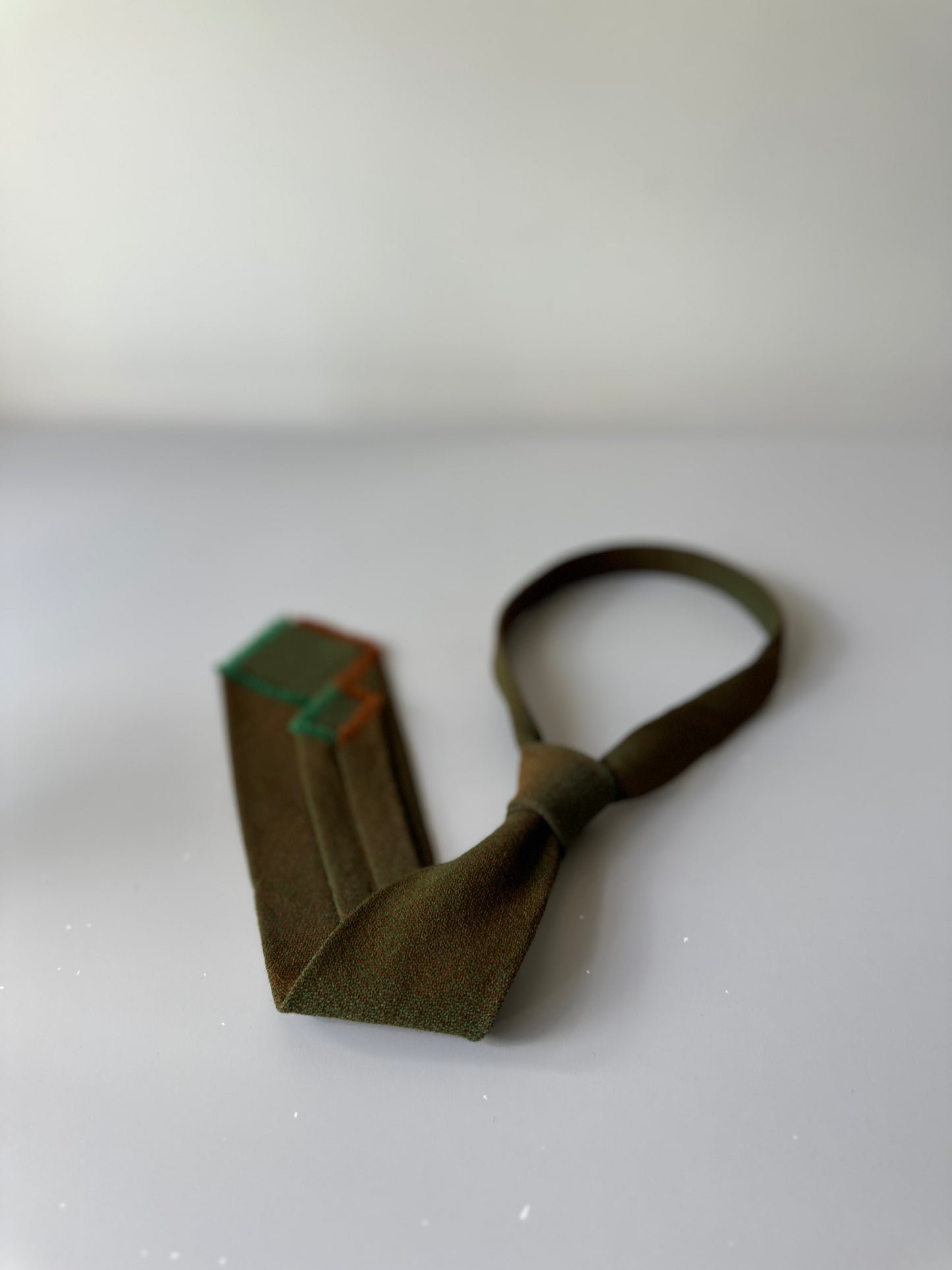 green toned tie