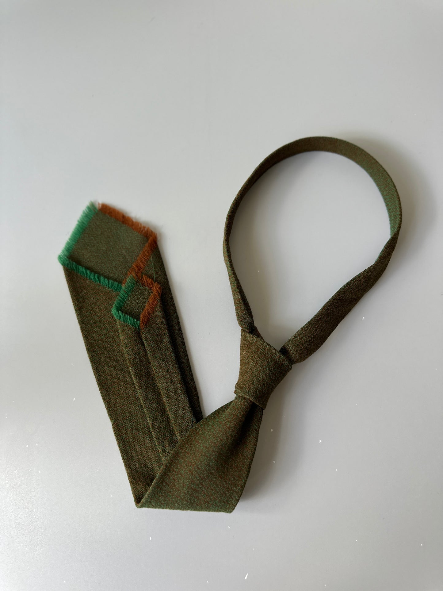 green toned tie