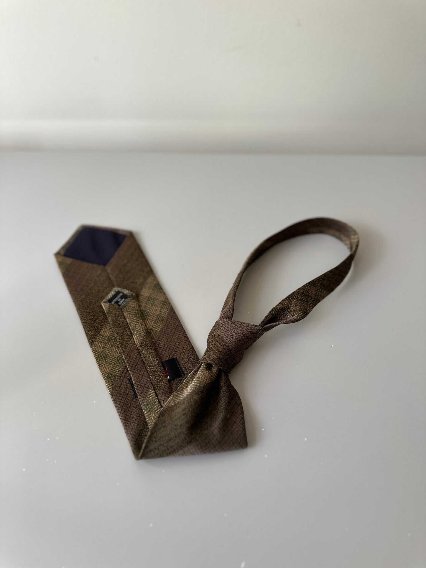 brown diagonal striped tie